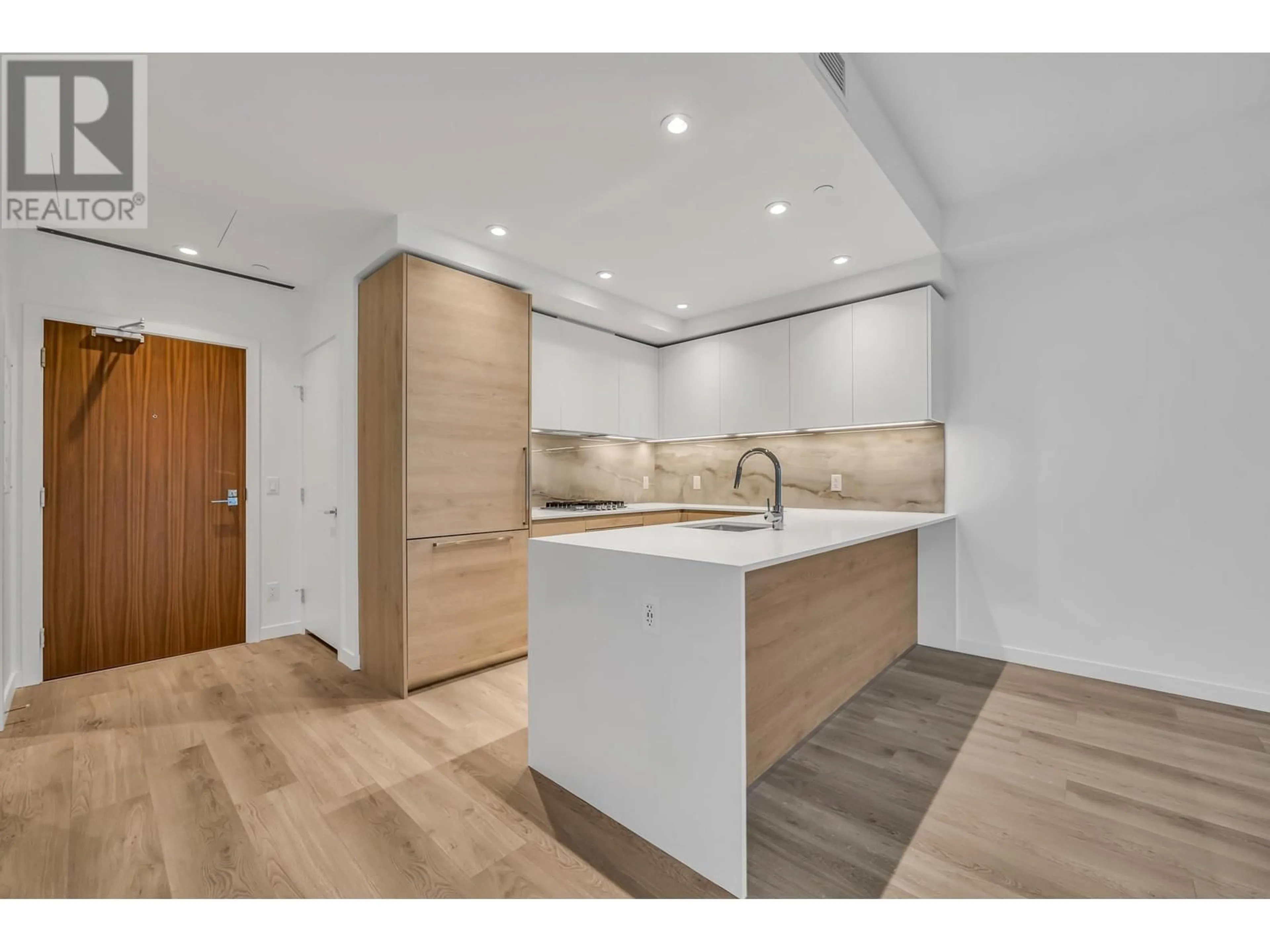 Open concept kitchen, wood/laminate floor for 404 - 680 QUAYSIDE DRIVE, New Westminster British Columbia V3M0P2