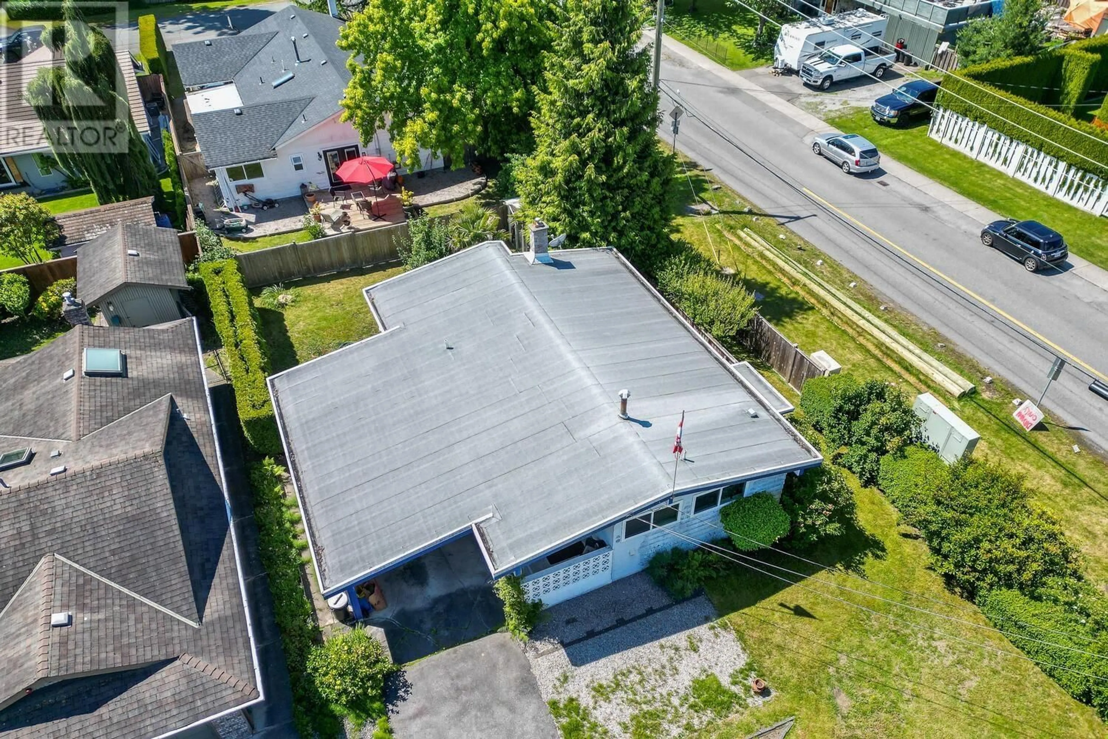 A pic from outside/outdoor area/front of a property/back of a property/a pic from drone, street for 5086 12 AVENUE, Delta British Columbia V4M2A8