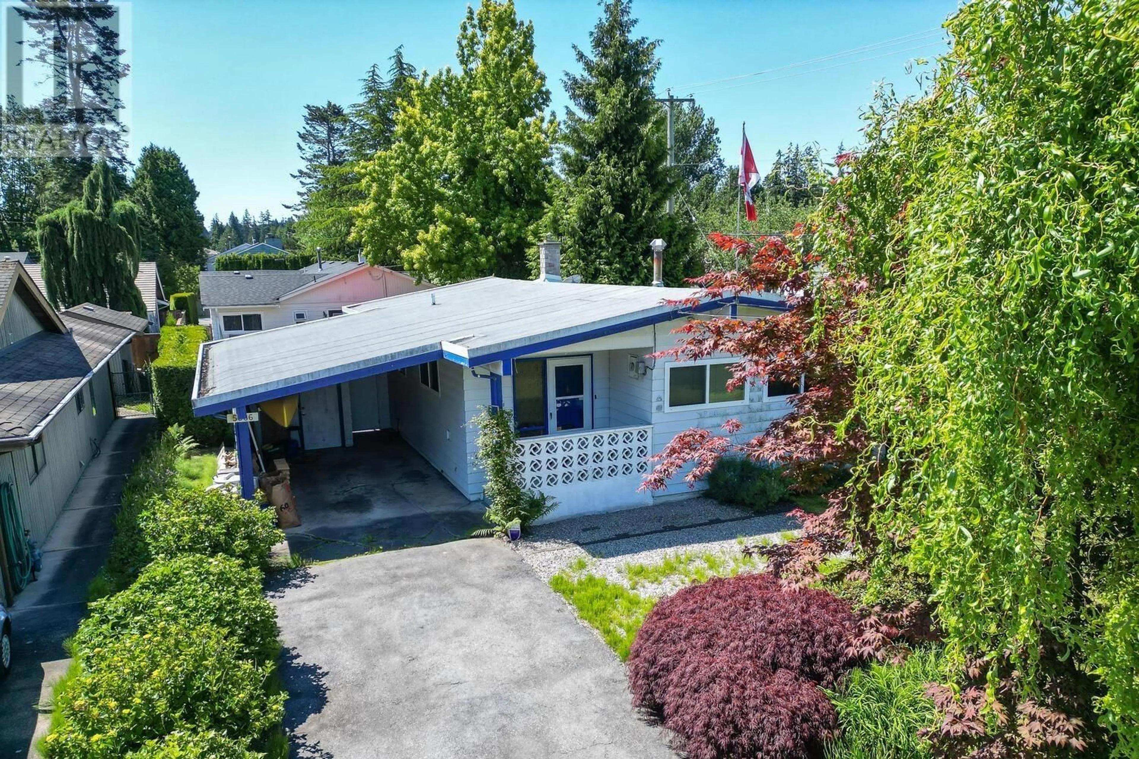 A pic from outside/outdoor area/front of a property/back of a property/a pic from drone, street for 5086 12 AVENUE, Delta British Columbia V4M2A8