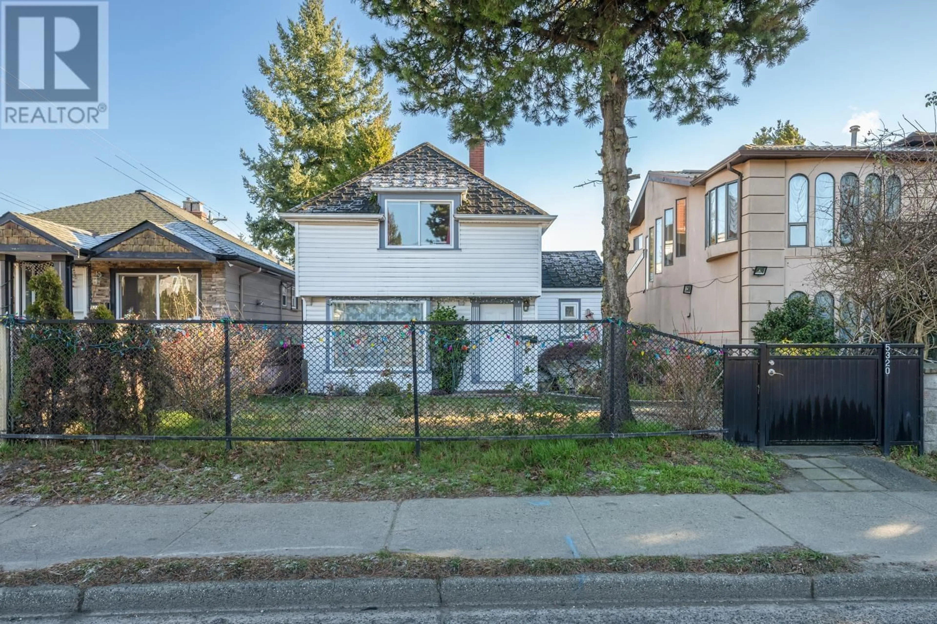 A pic from outside/outdoor area/front of a property/back of a property/a pic from drone, street for 5320 KNIGHT STREET, Vancouver British Columbia V5P2T9