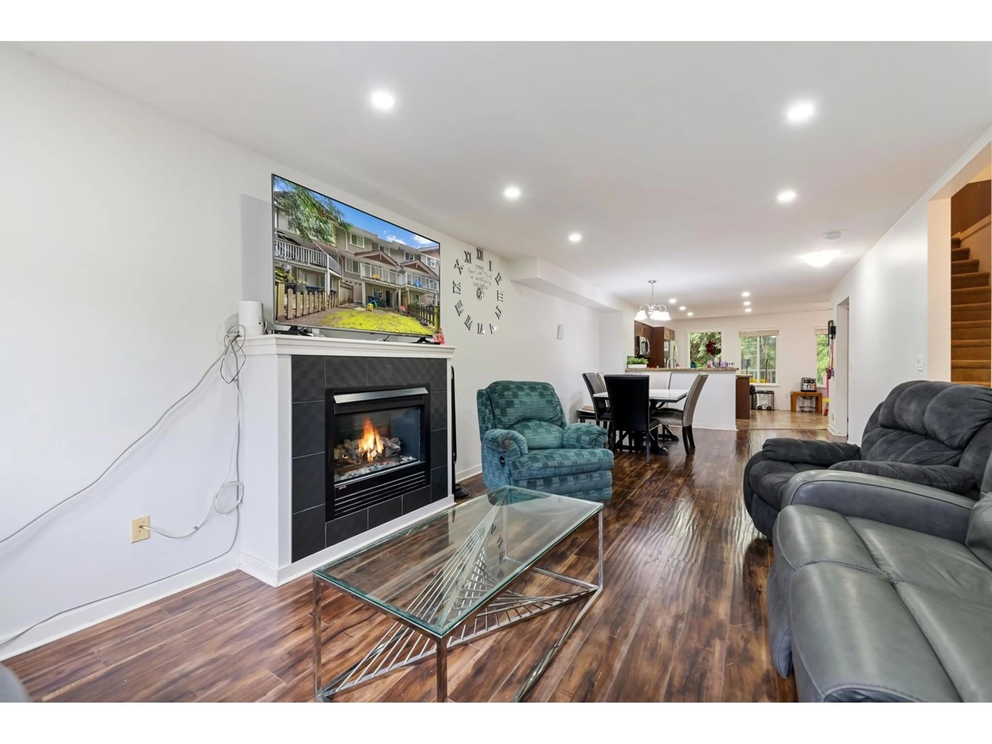 Living room with furniture, wood/laminate floor for 96 12711 64 AVENUE, Surrey British Columbia V3W1X1