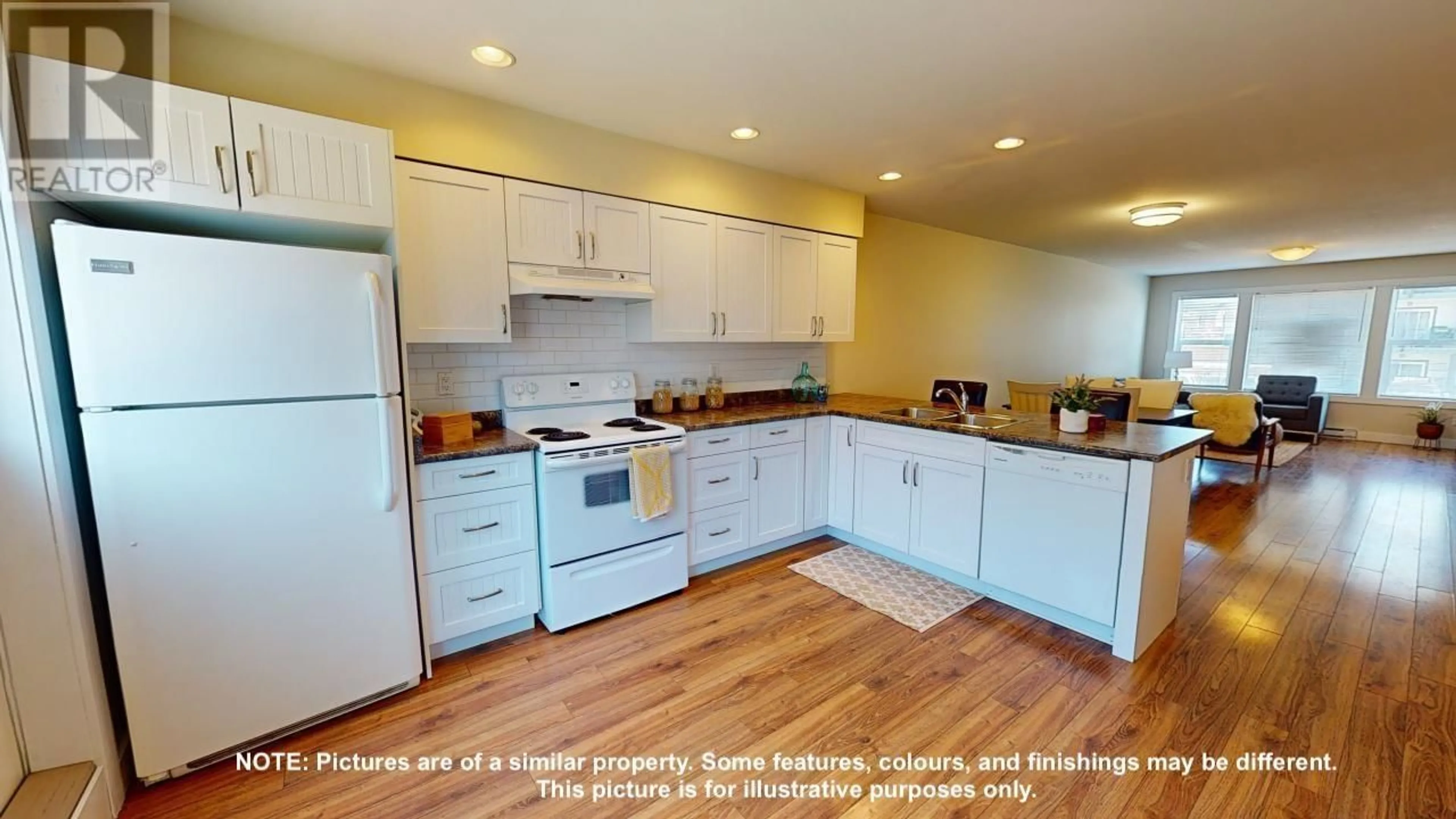 Standard kitchen, wood/laminate floor for 207 11703 102 STREET, Fort St. John British Columbia V1J0R7