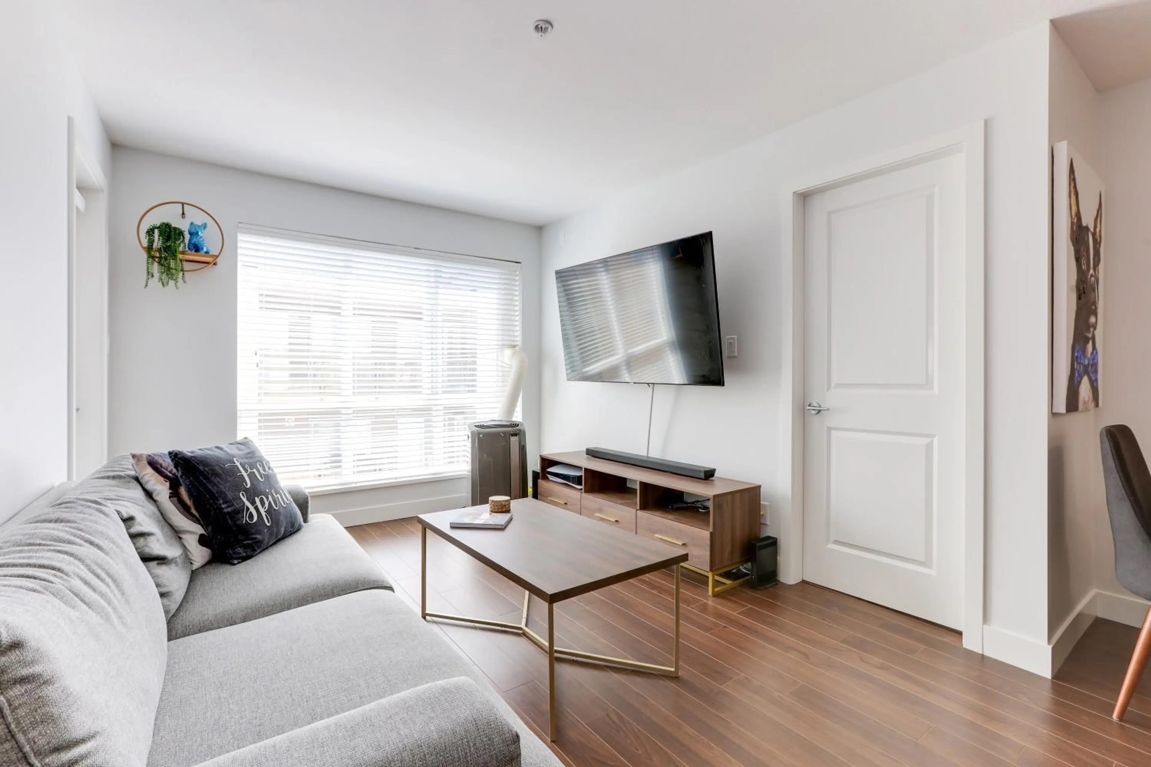 Living room with furniture, wood/laminate floor for 317 15745 CROYDON DRIVE, Surrey British Columbia V3S2L5