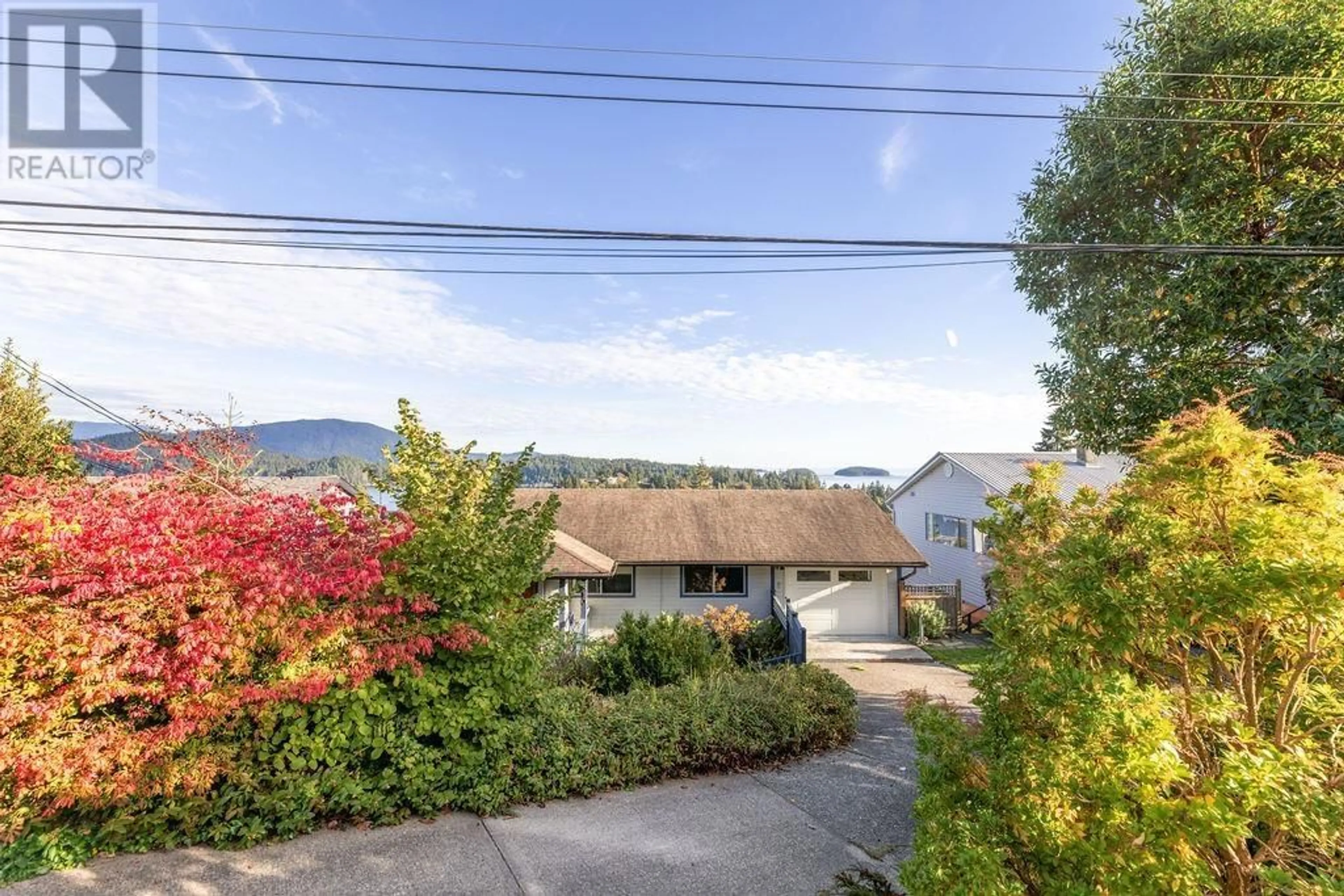 A pic from outside/outdoor area/front of a property/back of a property/a pic from drone, mountain view for 510 ABBS ROAD, Gibsons British Columbia V0N1V8