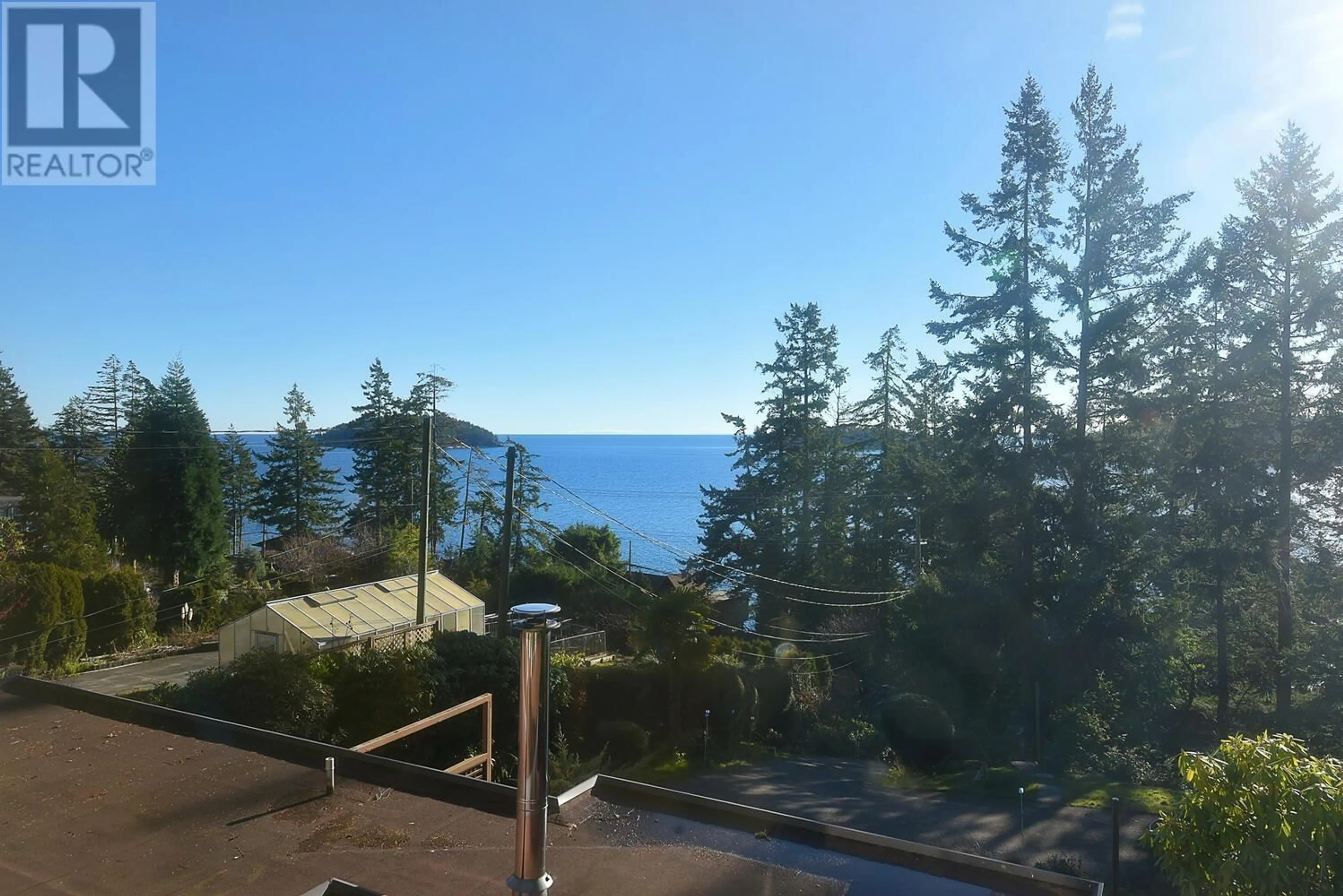 A pic from outside/outdoor area/front of a property/back of a property/a pic from drone, water/lake/river/ocean view for 6638 SUNSHINE COAST HIGHWAY, Sechelt British Columbia V7Z0M9