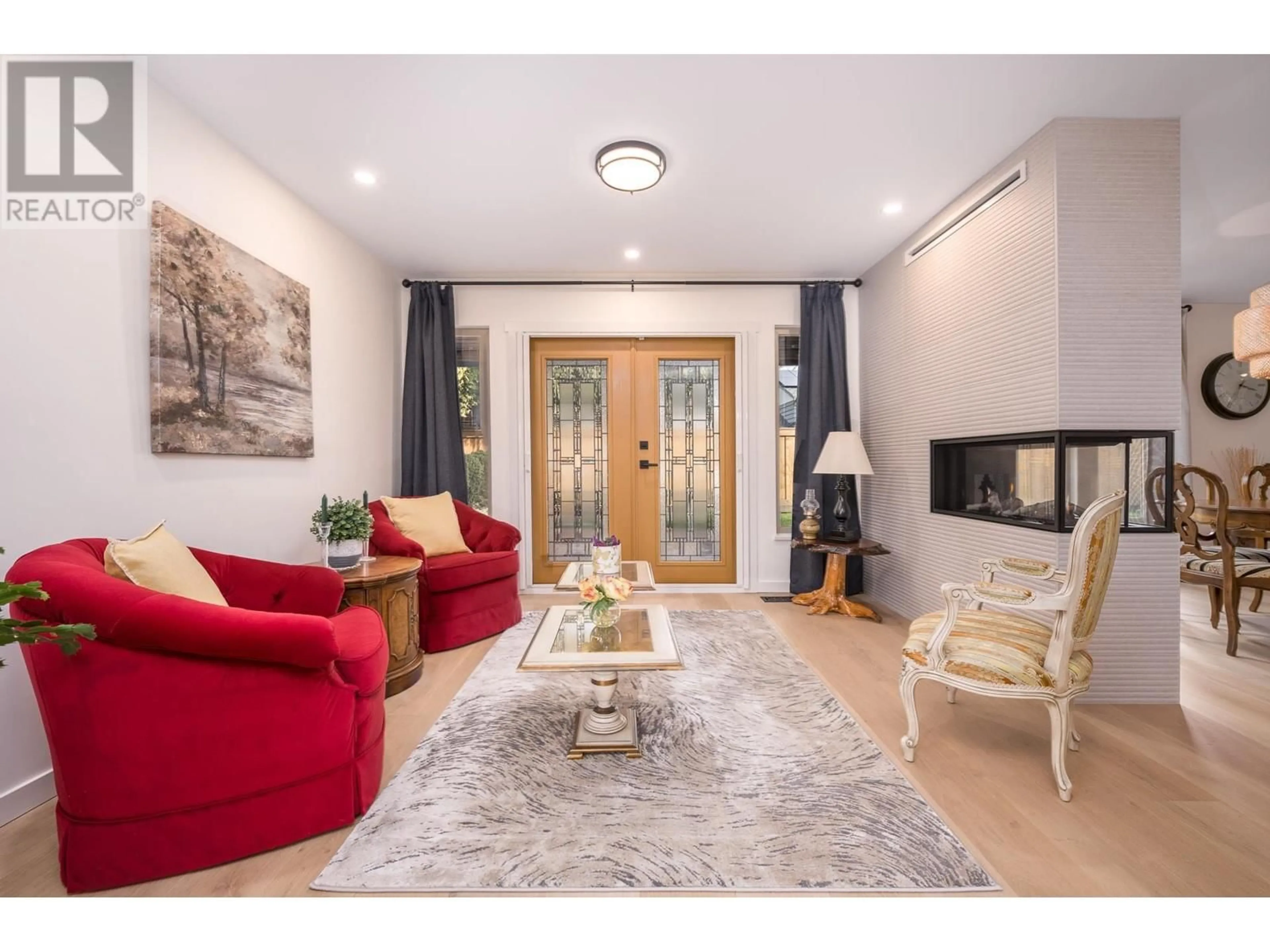 Living room with furniture, wood/laminate floor for 5494 CANDLEWYCK WYND, Delta British Columbia V4M3T6