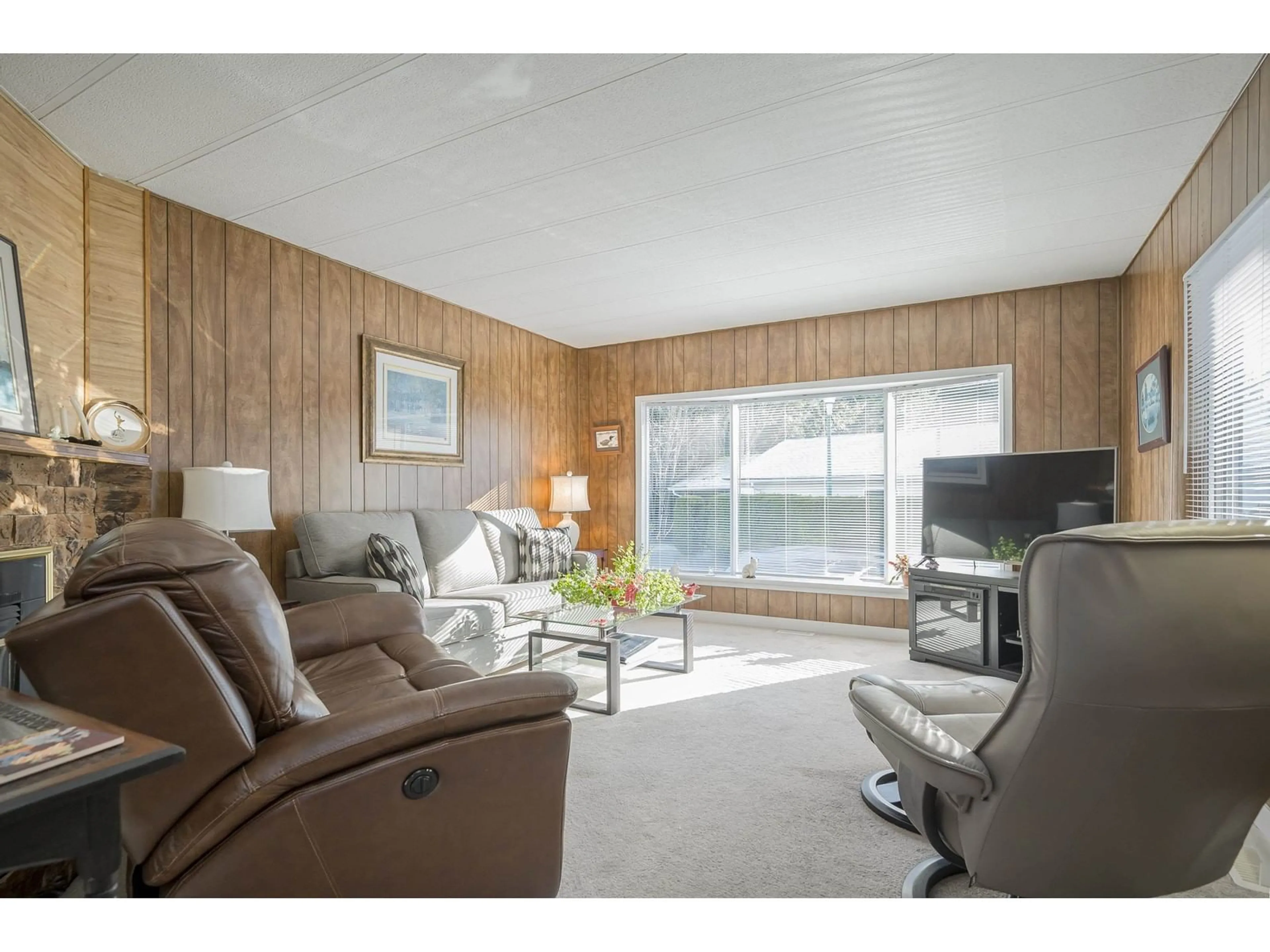 Living room with furniture, wood/laminate floor for 51 9080 198 STREET, Langley British Columbia V1M3A8