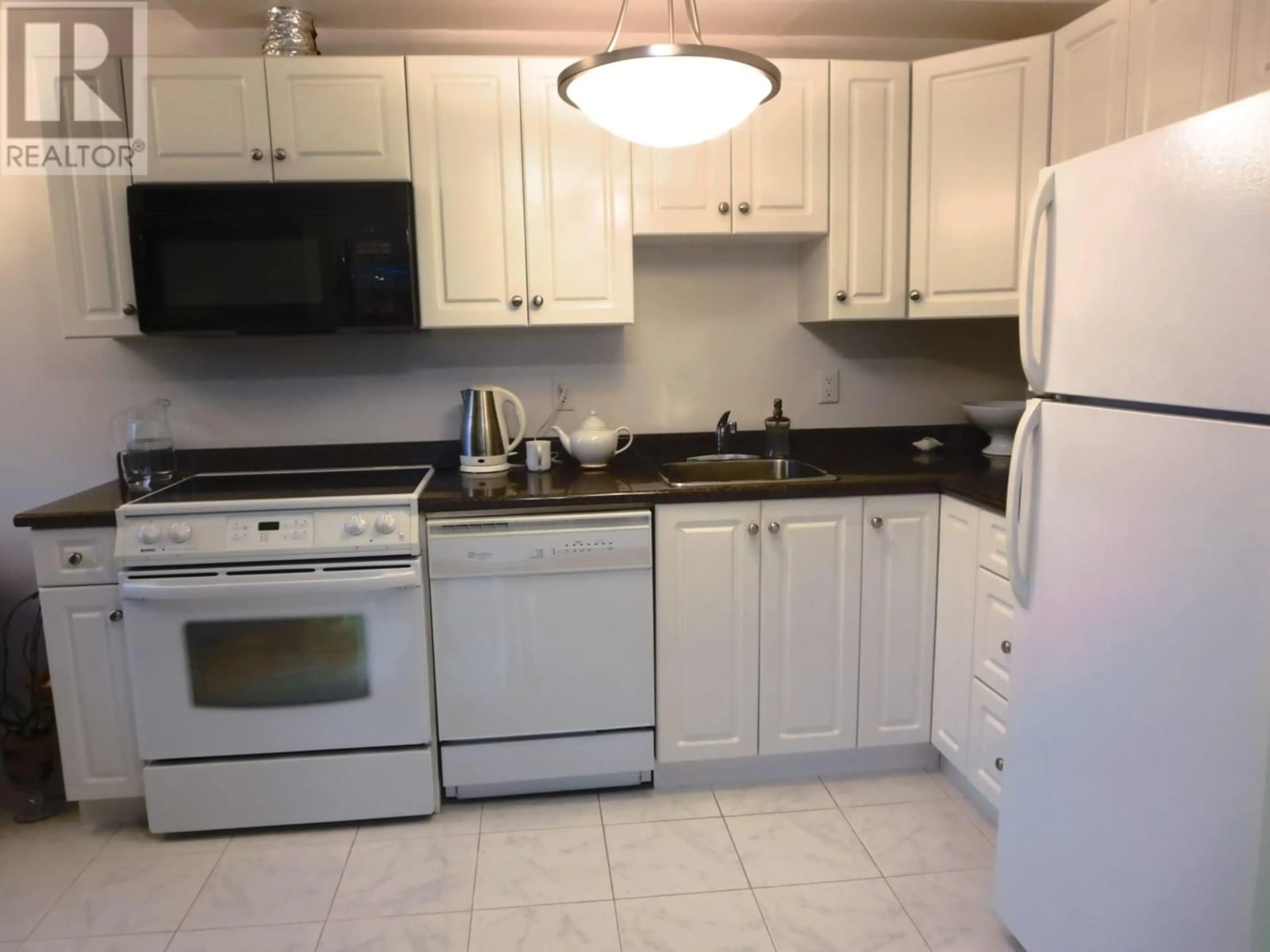 Standard kitchen, unknown for 103 7240 LINDSAY ROAD, Richmond British Columbia V7C3M6