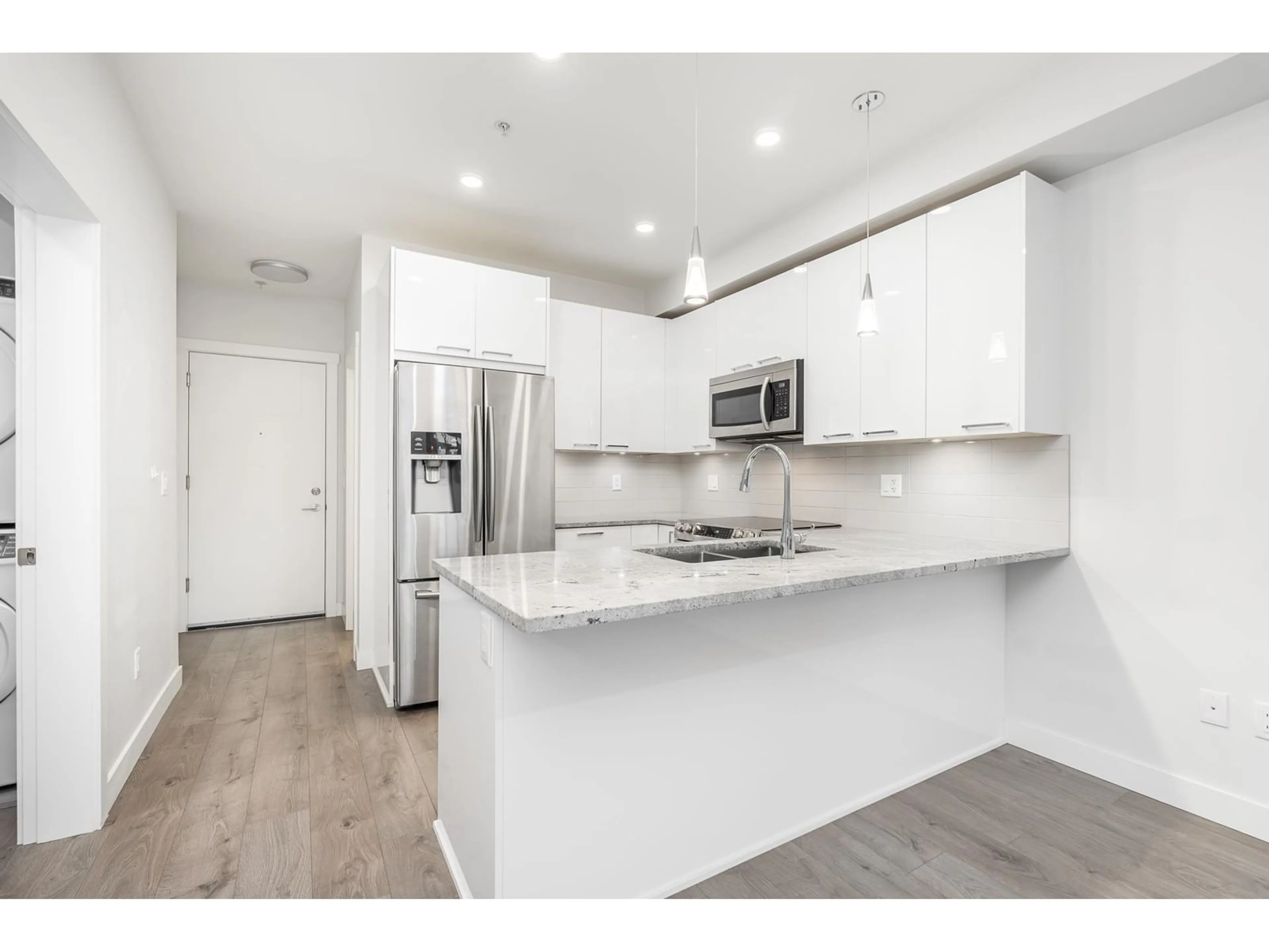 Open concept kitchen, unknown for 102 20686 EASTLEIGH CRESCENT, Langley British Columbia V3A0M4