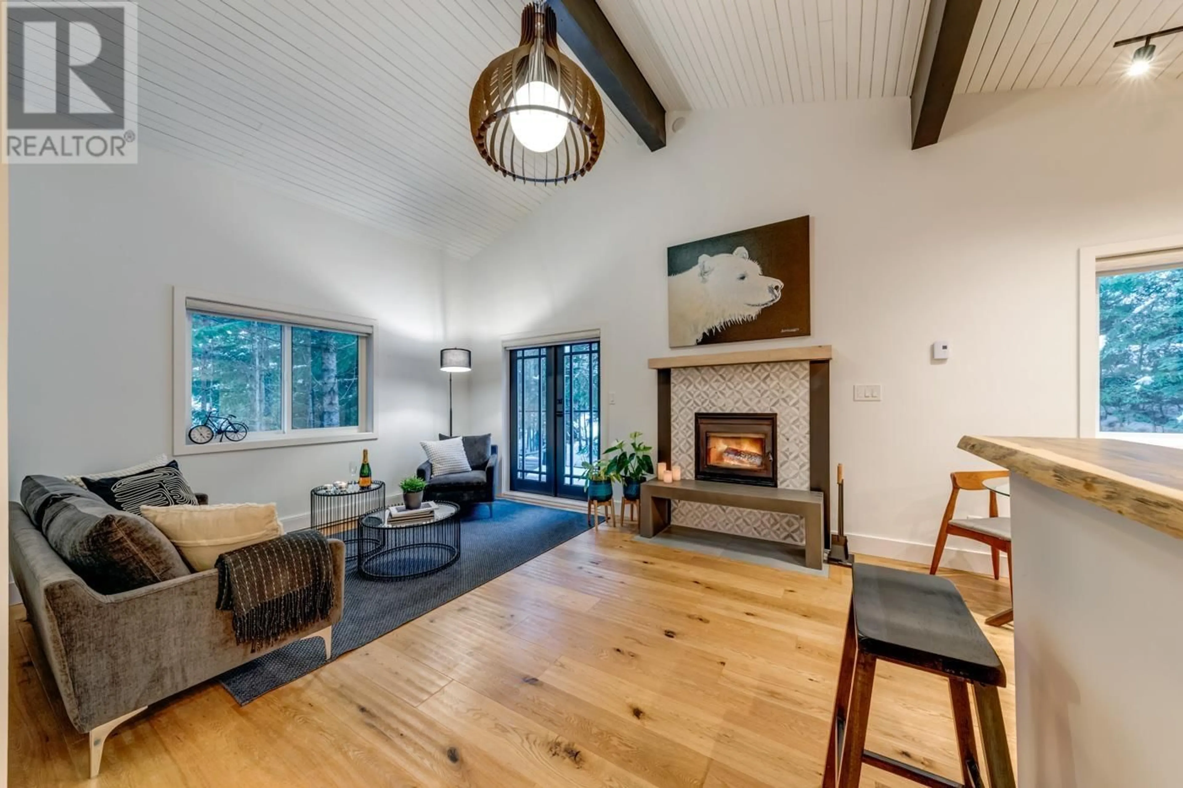 Living room with furniture, wood/laminate floor for 3273 ARBUTUS DRIVE, Whistler British Columbia V8E0B8