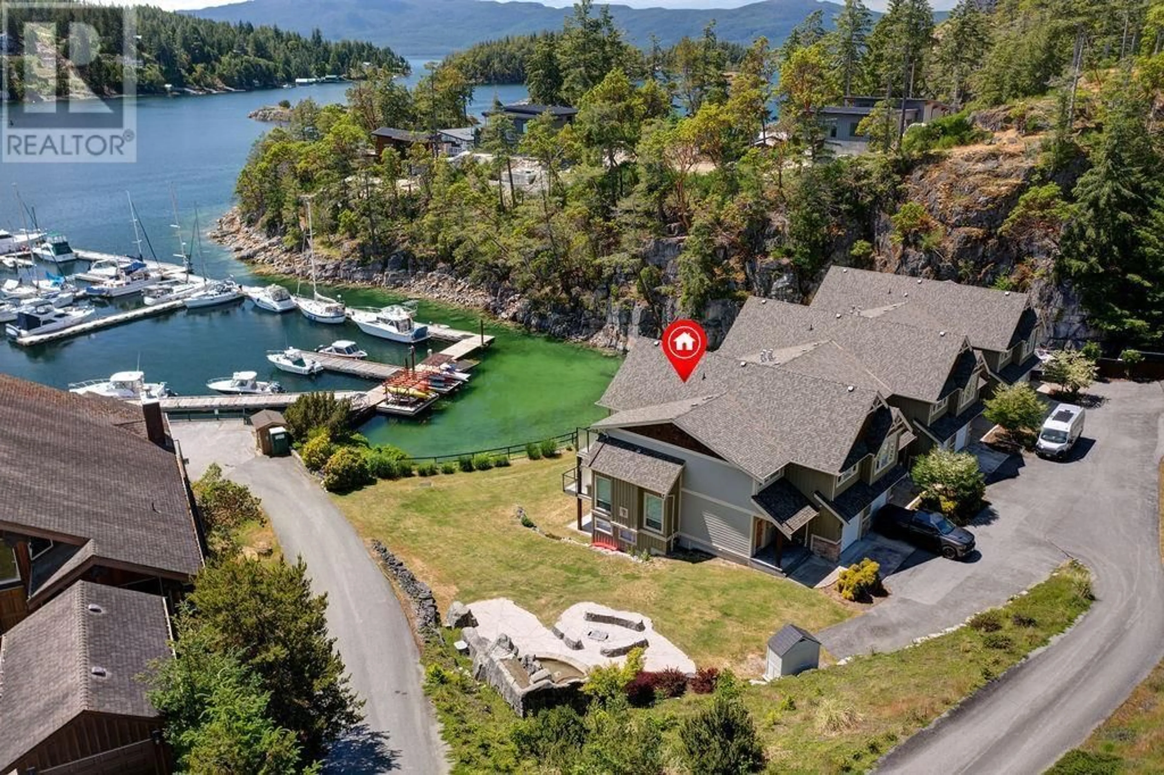 A pic from outside/outdoor area/front of a property/back of a property/a pic from drone, water/lake/river/ocean view for 50 - 4622 SINCLAIR BAY ROAD, Egmont British Columbia V0N1S1