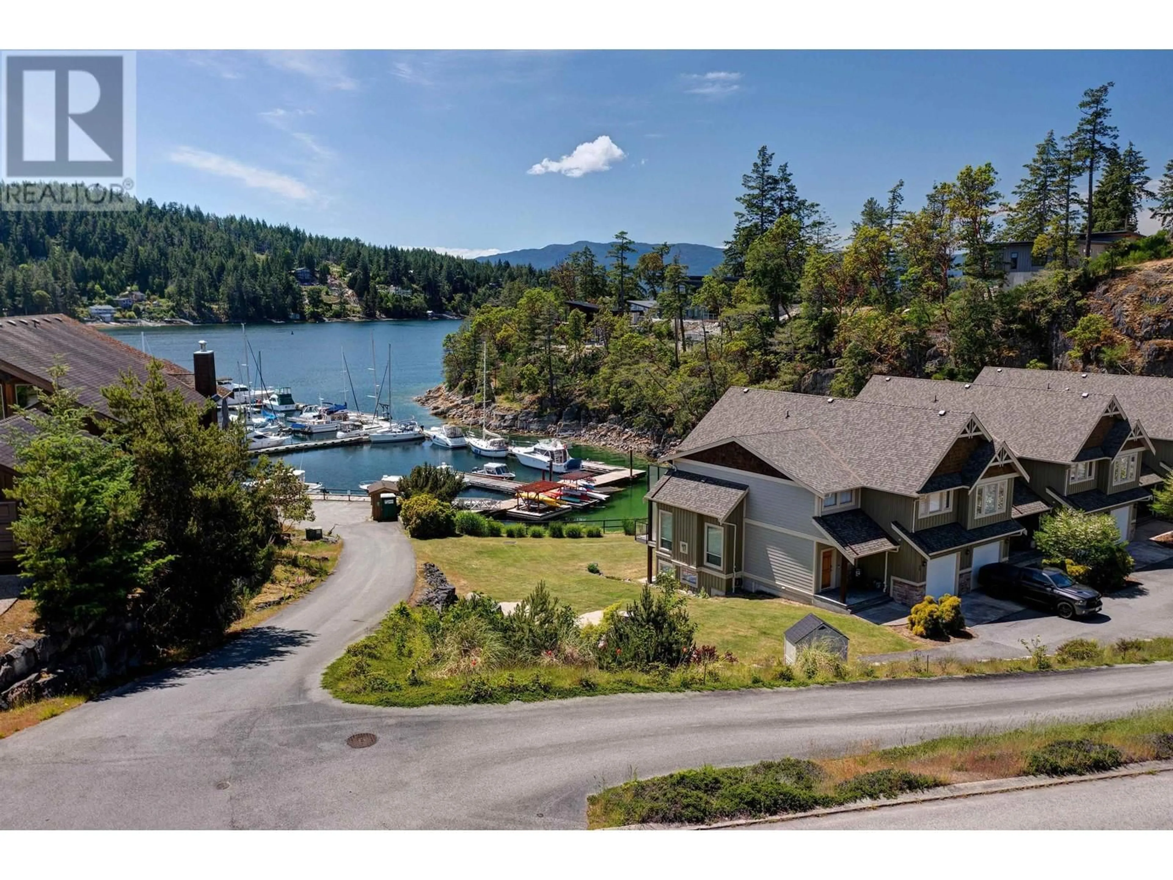 A pic from outside/outdoor area/front of a property/back of a property/a pic from drone, water/lake/river/ocean view for 50 4622 SINCLAIR BAY ROAD, Egmont British Columbia V0N1S1