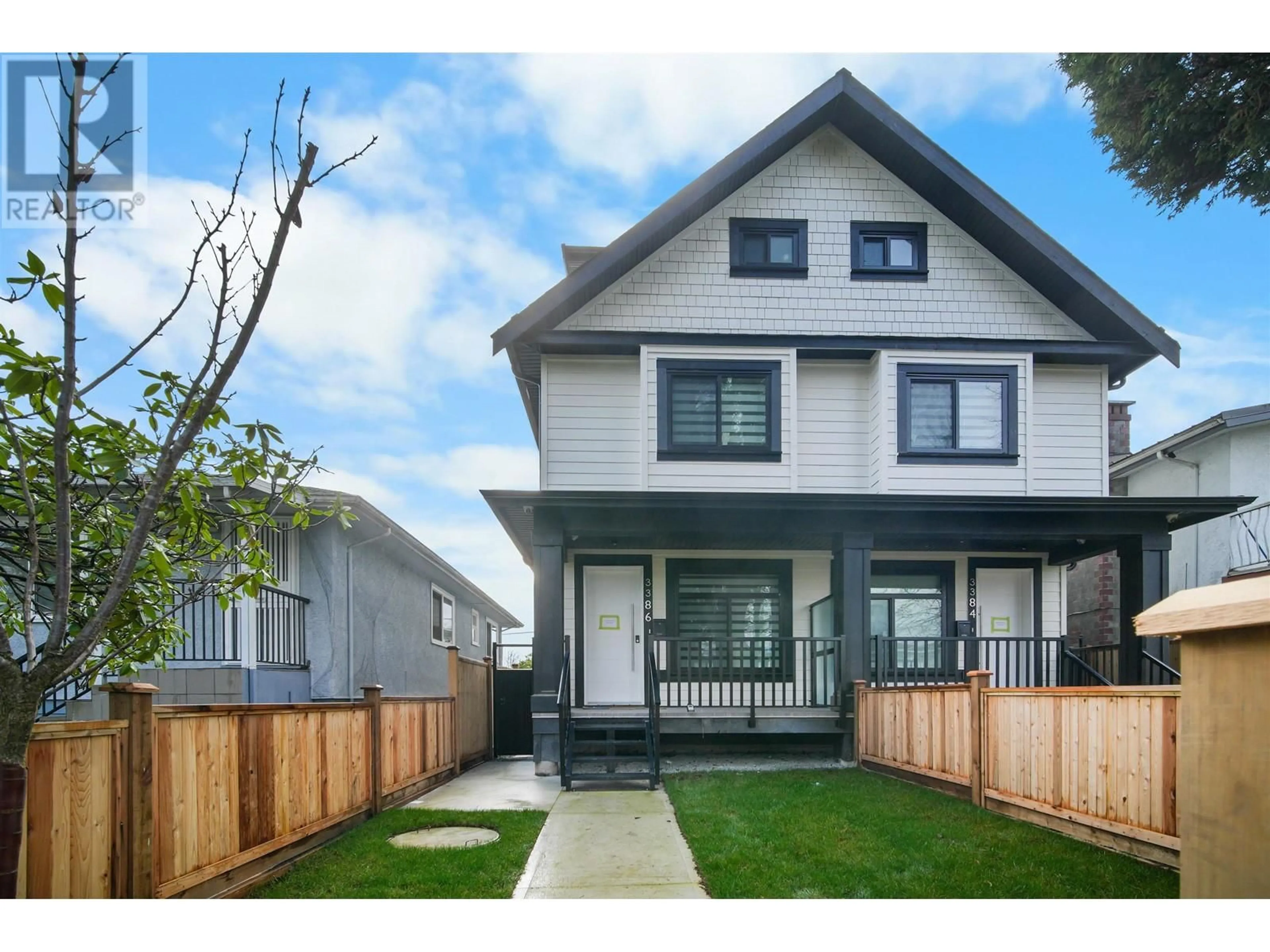 Home with vinyl exterior material, street for 3384 E 2ND AVENUE, Vancouver British Columbia V5M1G5