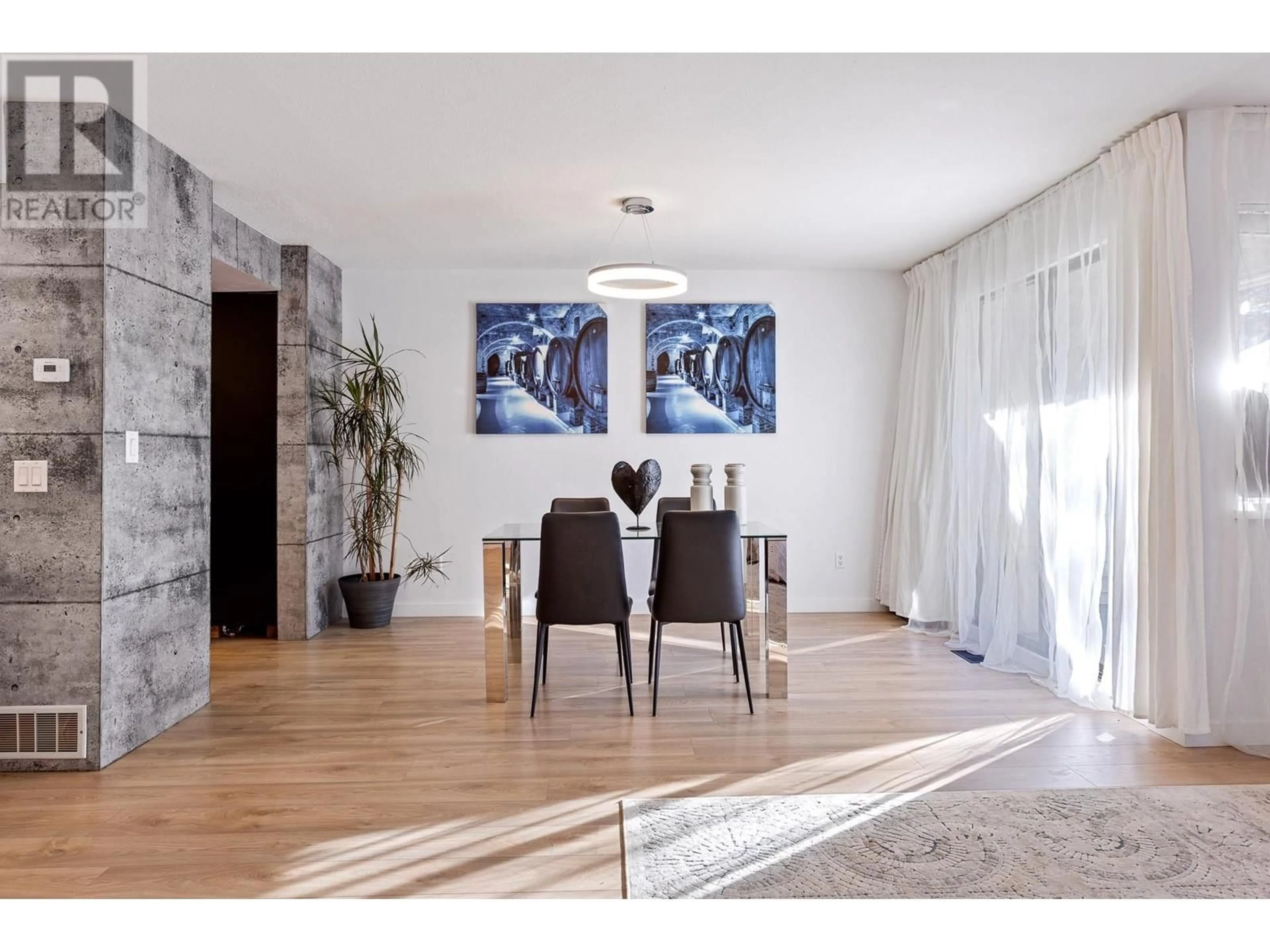 Dining room, wood/laminate floor for 208 - 1220 FALCON DRIVE, Coquitlam British Columbia V3E2E5