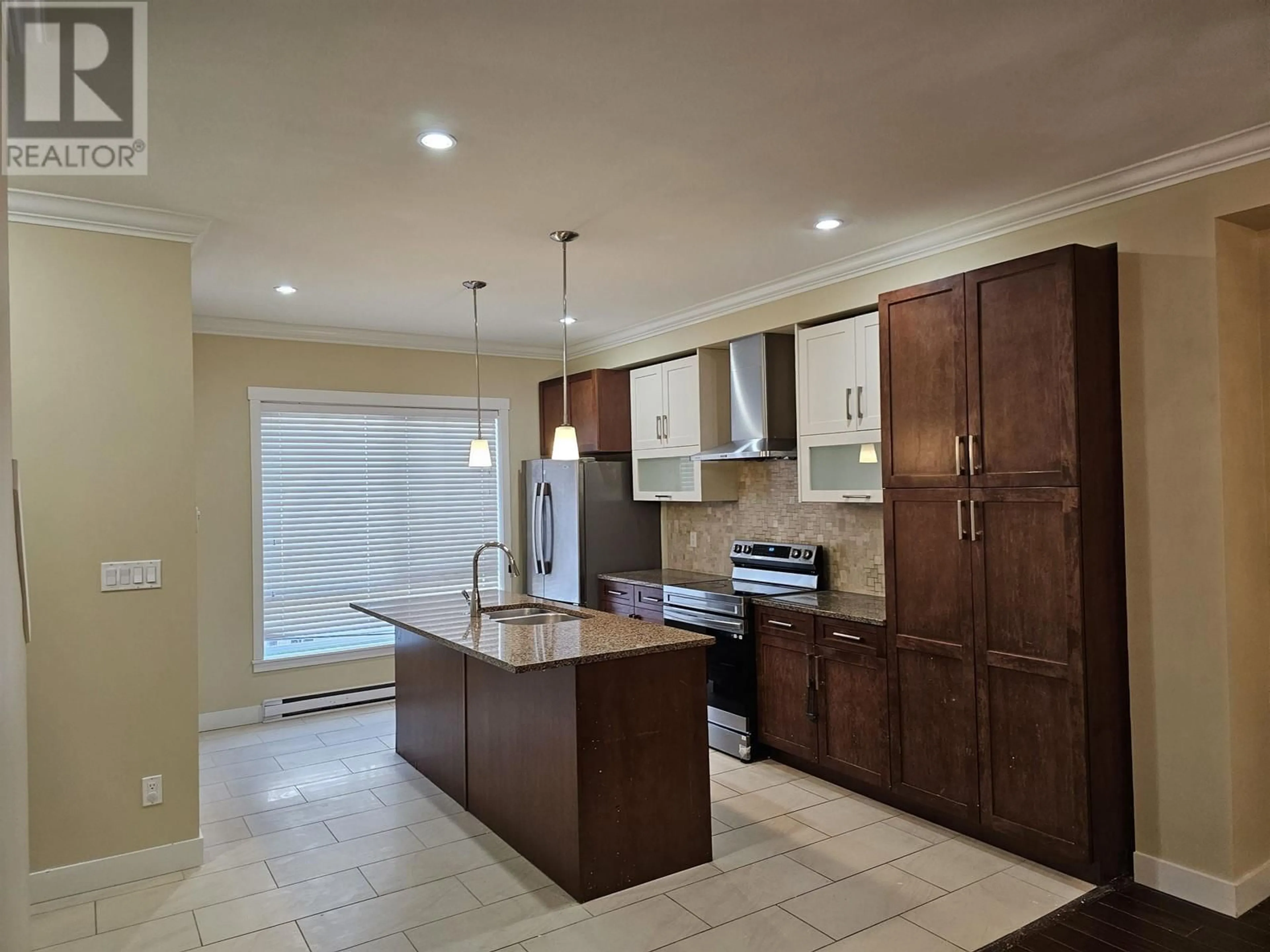 Open concept kitchen, ceramic/tile floor for 27 - 6199 BIRCH STREET, Richmond British Columbia V6Y0E4