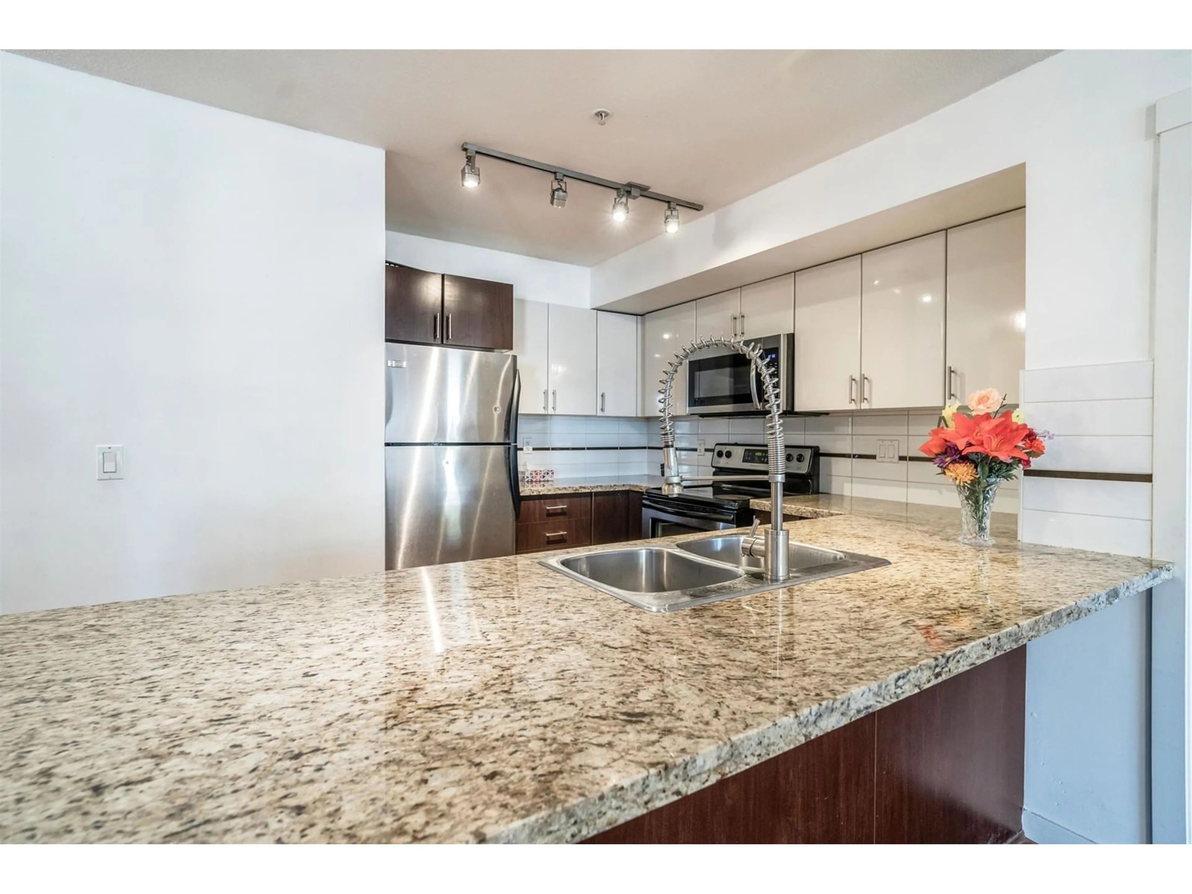 Open concept kitchen, unknown for 217 14960 102A AVENUE, Surrey British Columbia V3R6A3