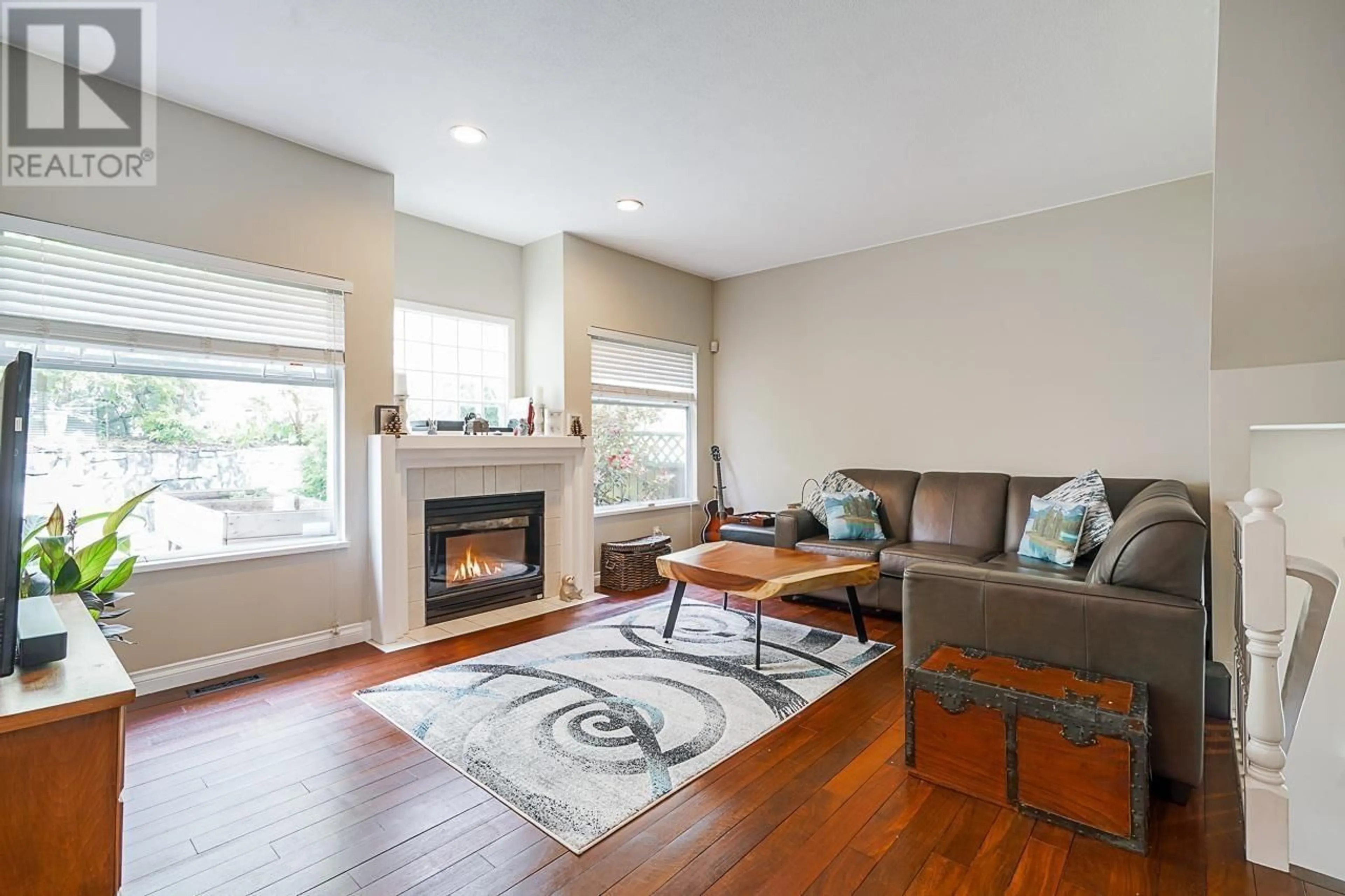 Living room with furniture, wood/laminate floor for 28 2951 PANORAMA DRIVE, Coquitlam British Columbia V3E2W3