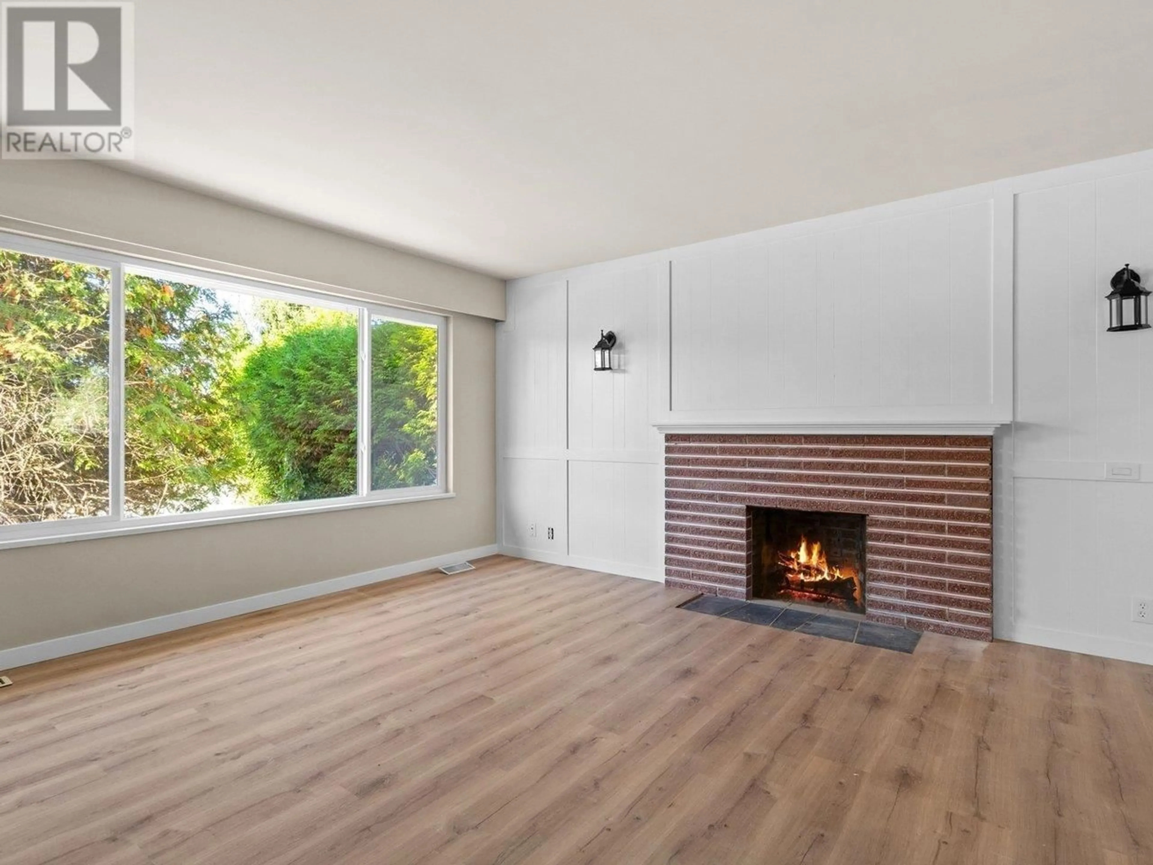 Living room with furniture, wood/laminate floor for 679 POIRIER STREET, Coquitlam British Columbia V3J6B3