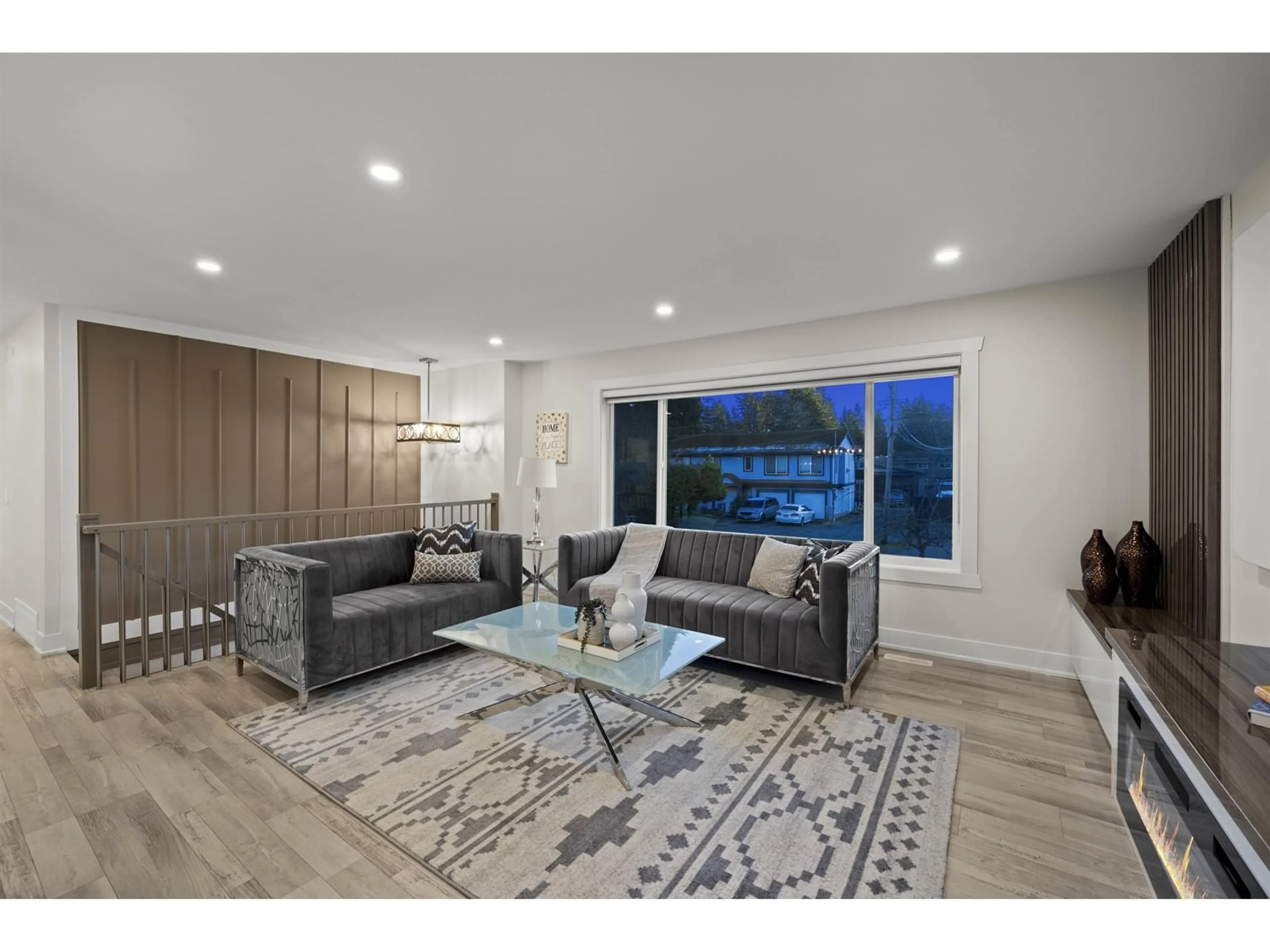 Living room with furniture, wood/laminate floor for 20367 37B AVENUE, Langley British Columbia V3A2T2