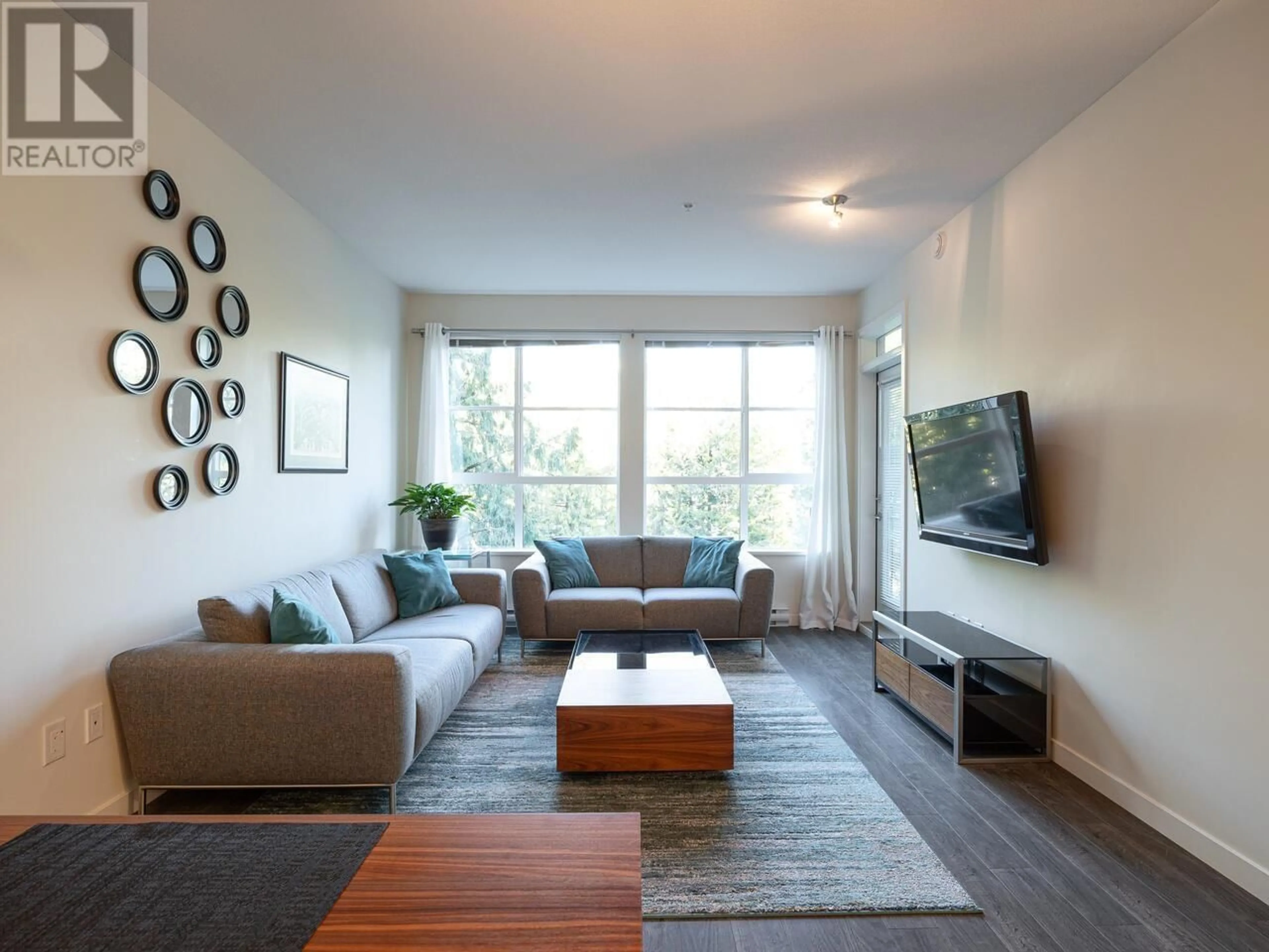 Living room with furniture, wood/laminate floor for 402 1151 WINDSOR MEWS, Coquitlam British Columbia V3B0M9