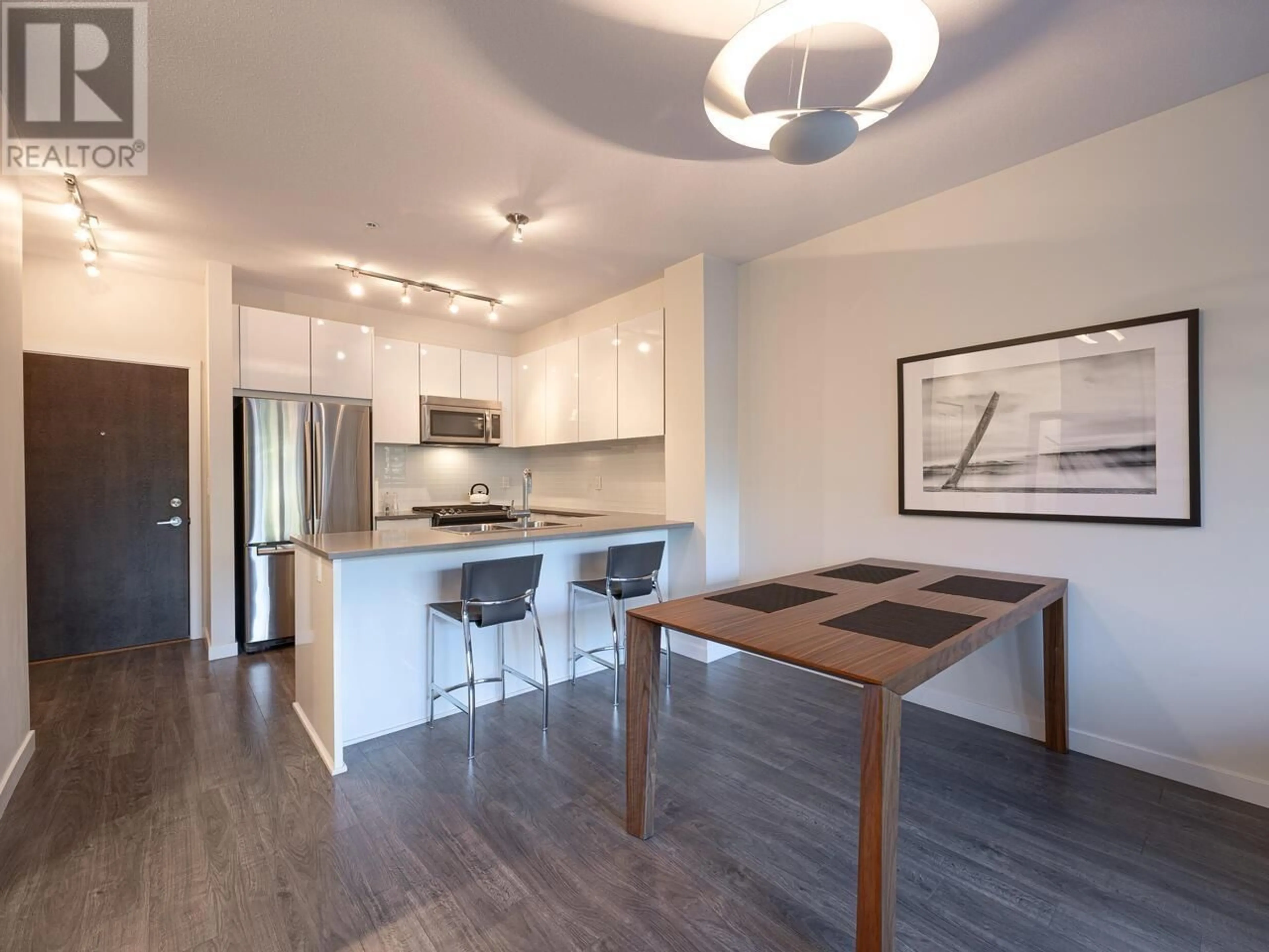 Open concept kitchen, wood/laminate floor for 402 1151 WINDSOR MEWS, Coquitlam British Columbia V3B0M9