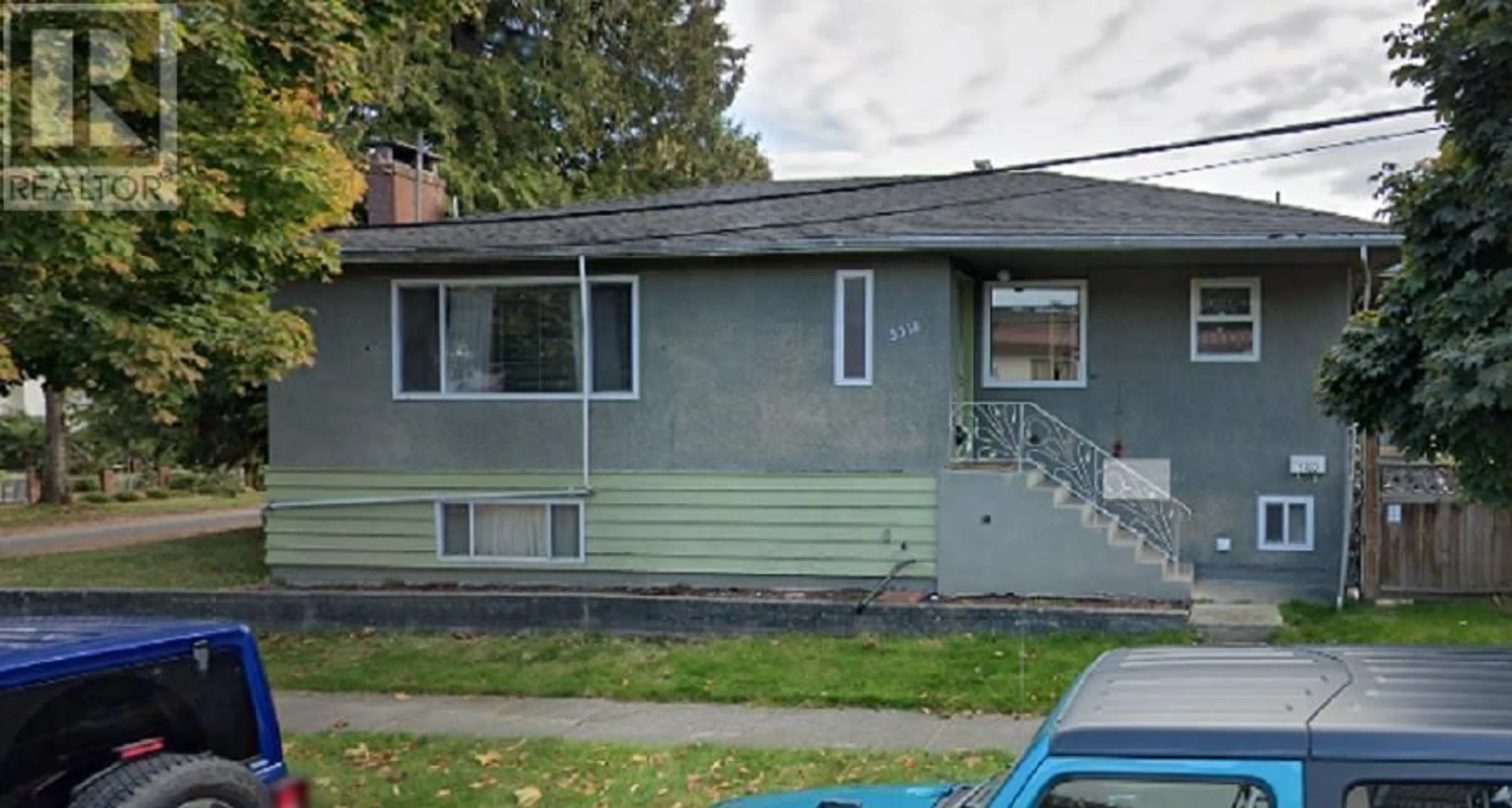 Home with vinyl exterior material, street for 5318- - 5320 BRUCE STREET, Vancouver British Columbia V5P3M3