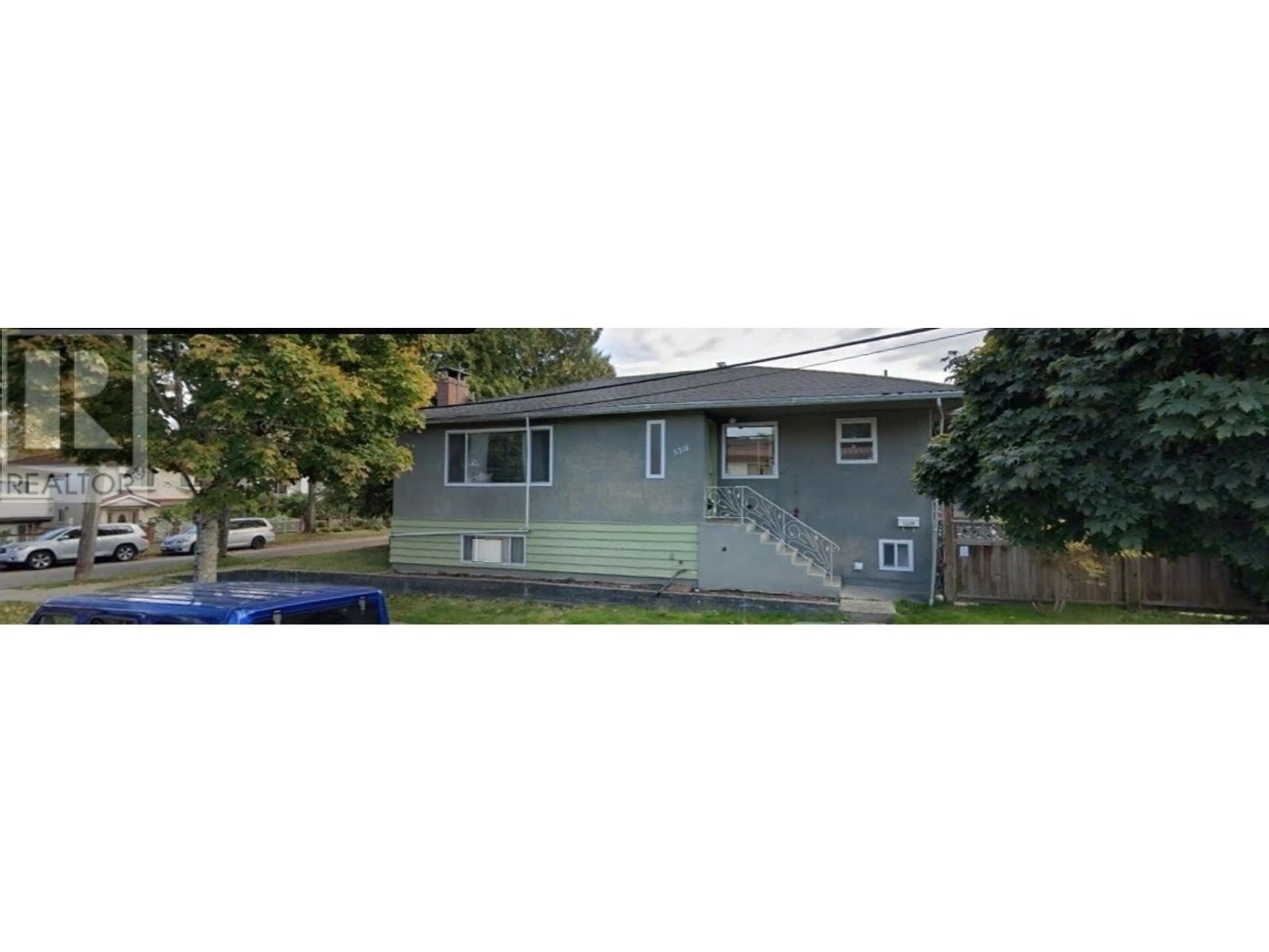 Home with vinyl exterior material, street for 5318- 5320 BRUCE STREET, Vancouver British Columbia V5P3M3