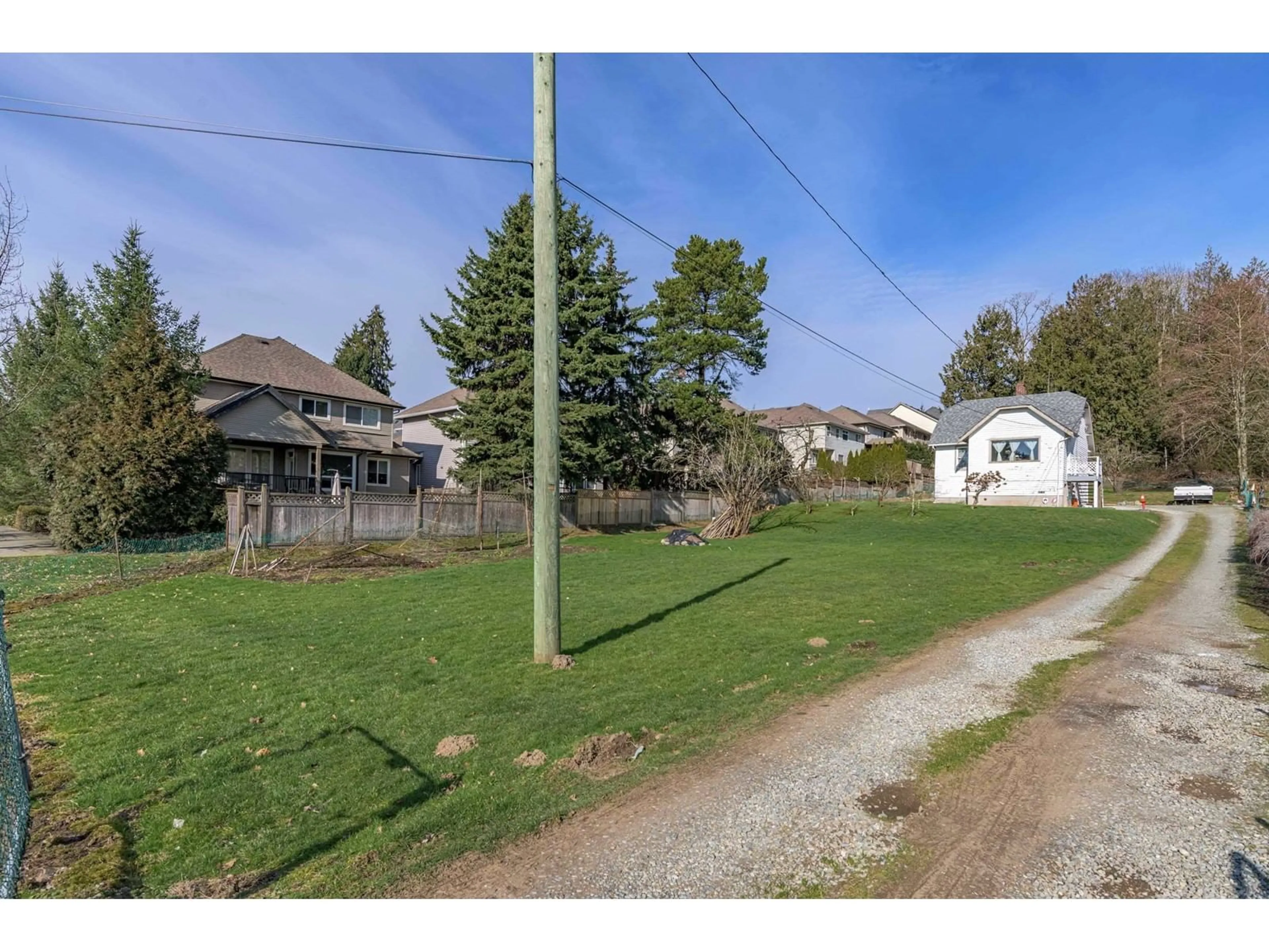 A pic from outside/outdoor area/front of a property/back of a property/a pic from drone, street for 19957 68 AVENUE, Langley British Columbia V2Y2W5