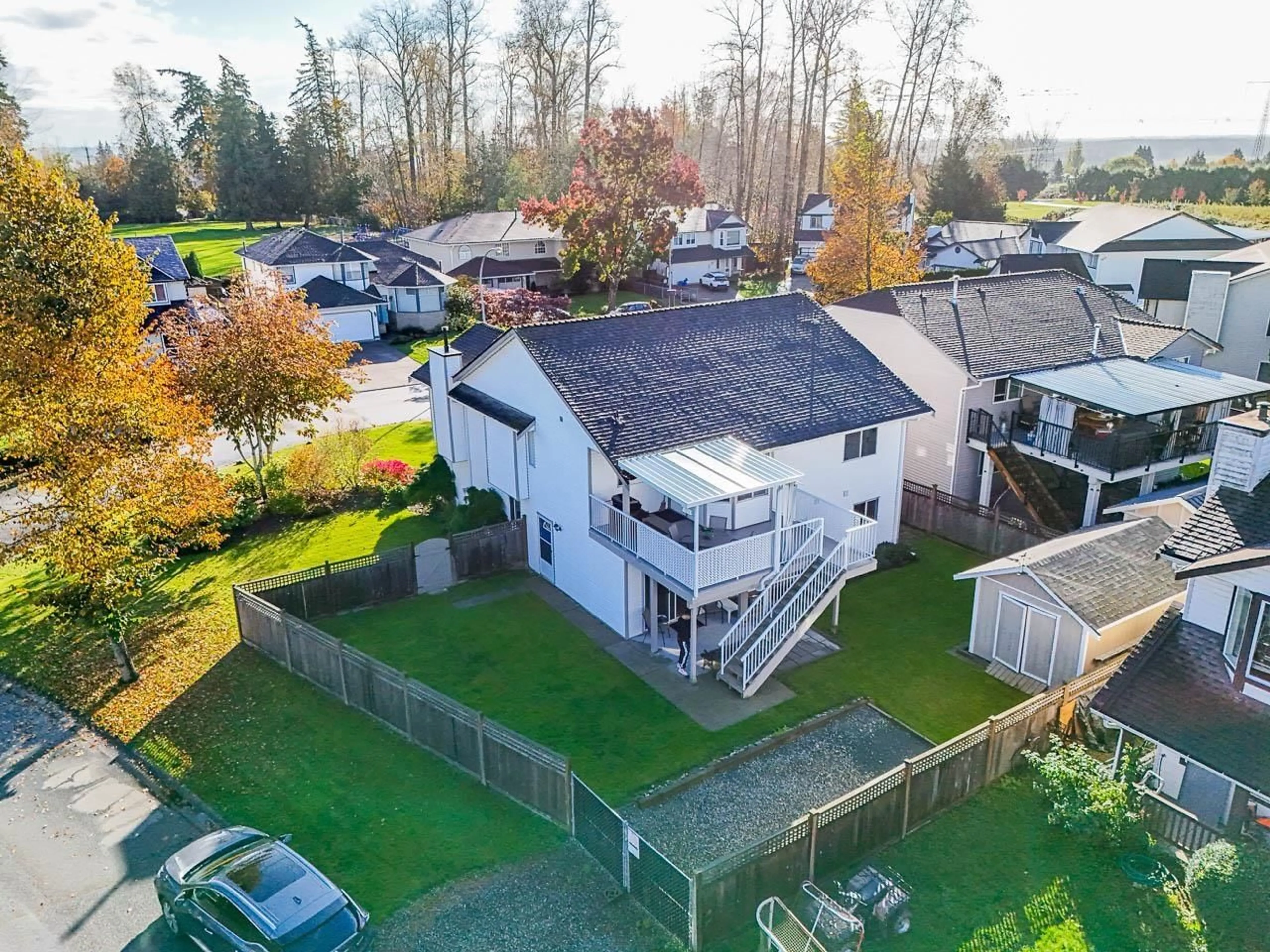 A pic from outside/outdoor area/front of a property/back of a property/a pic from drone, street for 5885 186A STREET, Surrey British Columbia V3S7Z9