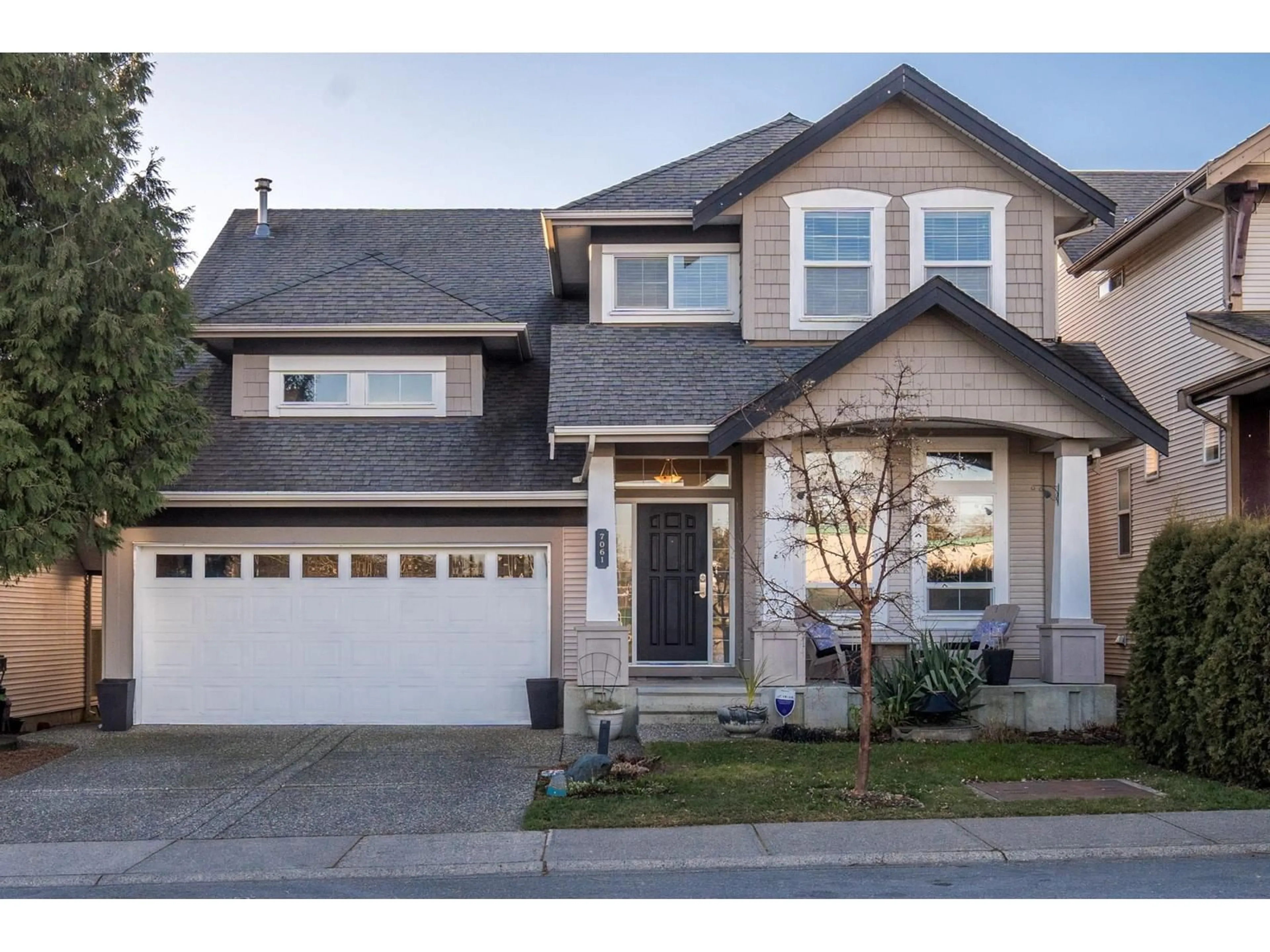 Home with vinyl exterior material, street for 7061 201 STREET, Langley British Columbia V2Y2Z3