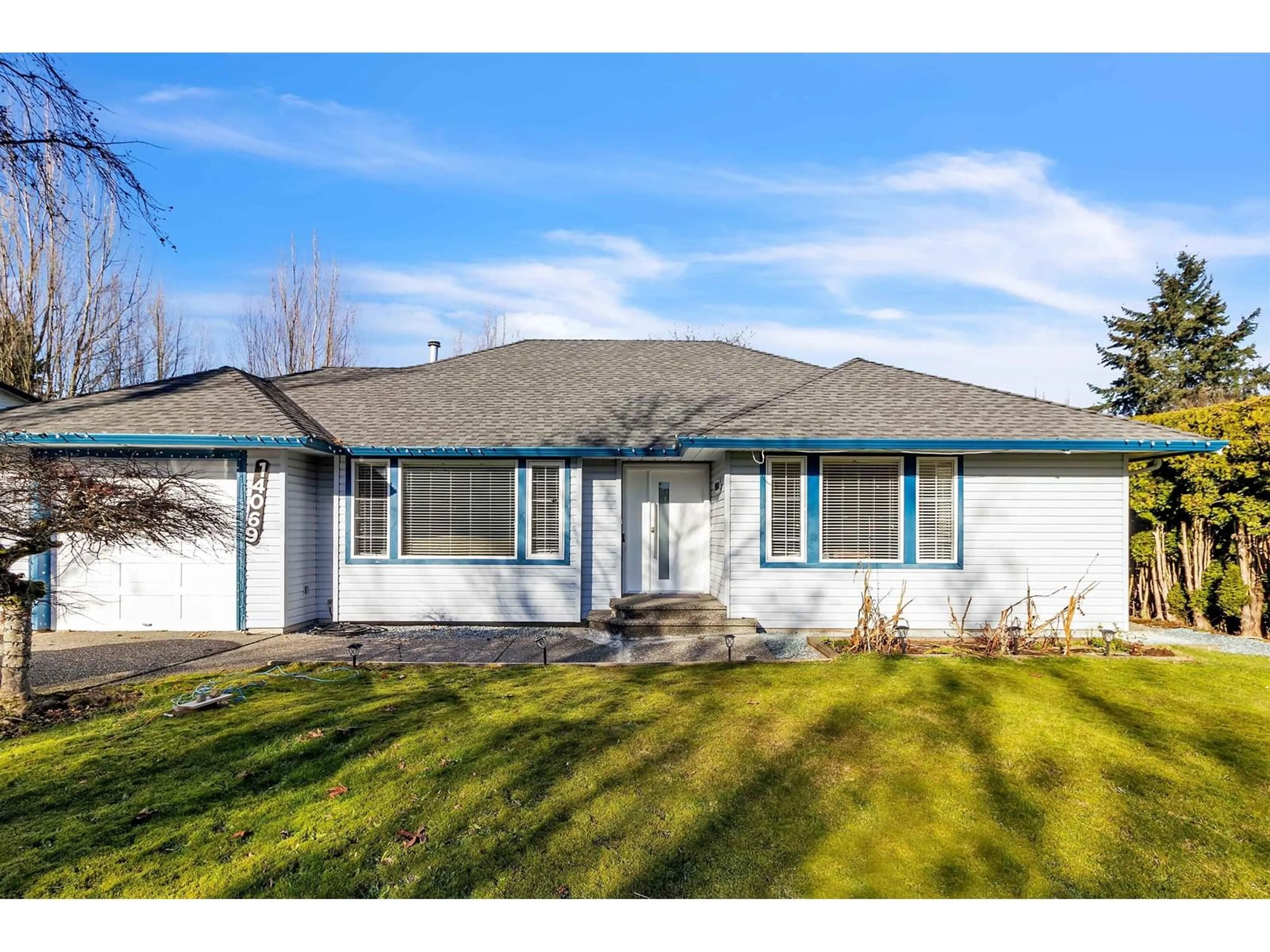 Home with vinyl exterior material, street for 14069 74 AVENUE, Surrey British Columbia V3W7N1