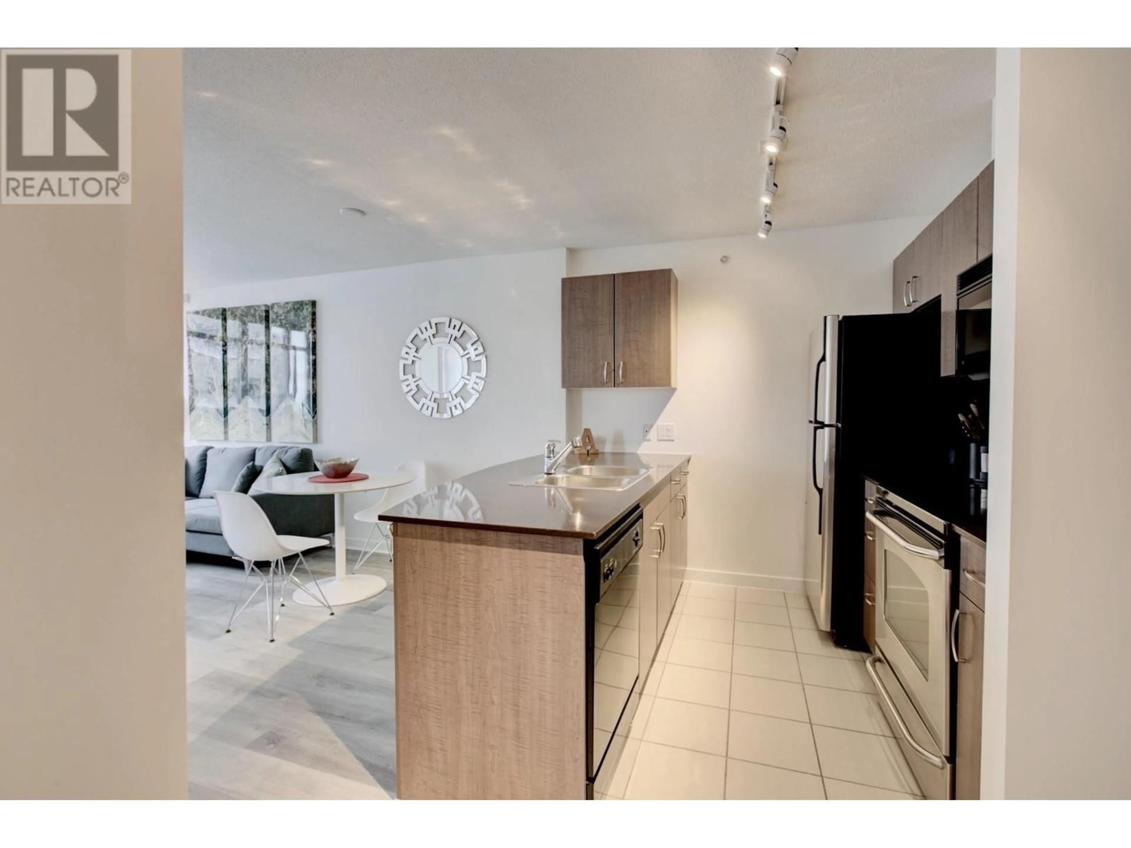 Open concept kitchen, ceramic/tile floor for 2906 610 GRANVILLE STREET, Vancouver British Columbia V6C3T3