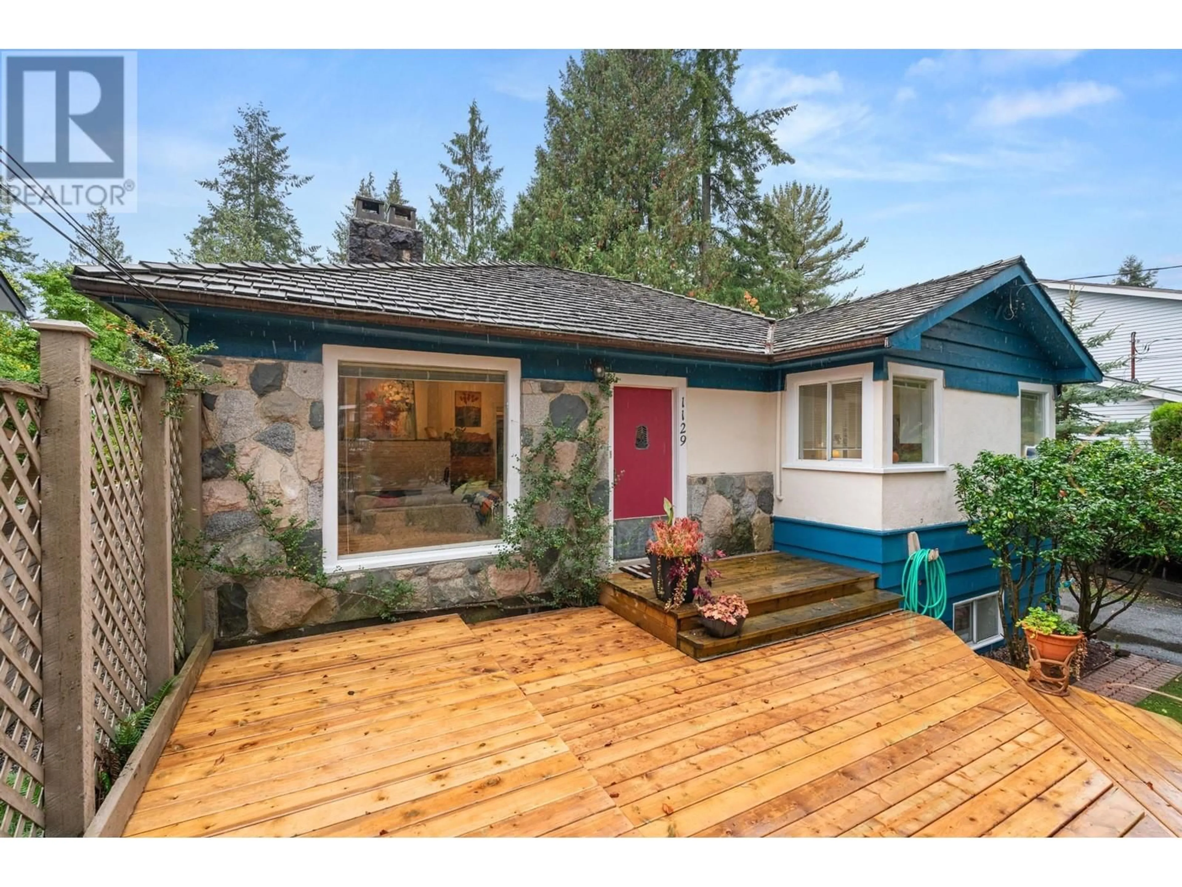 Home with vinyl exterior material, street for 1129 W 24TH STREET, North Vancouver British Columbia V7P2J1