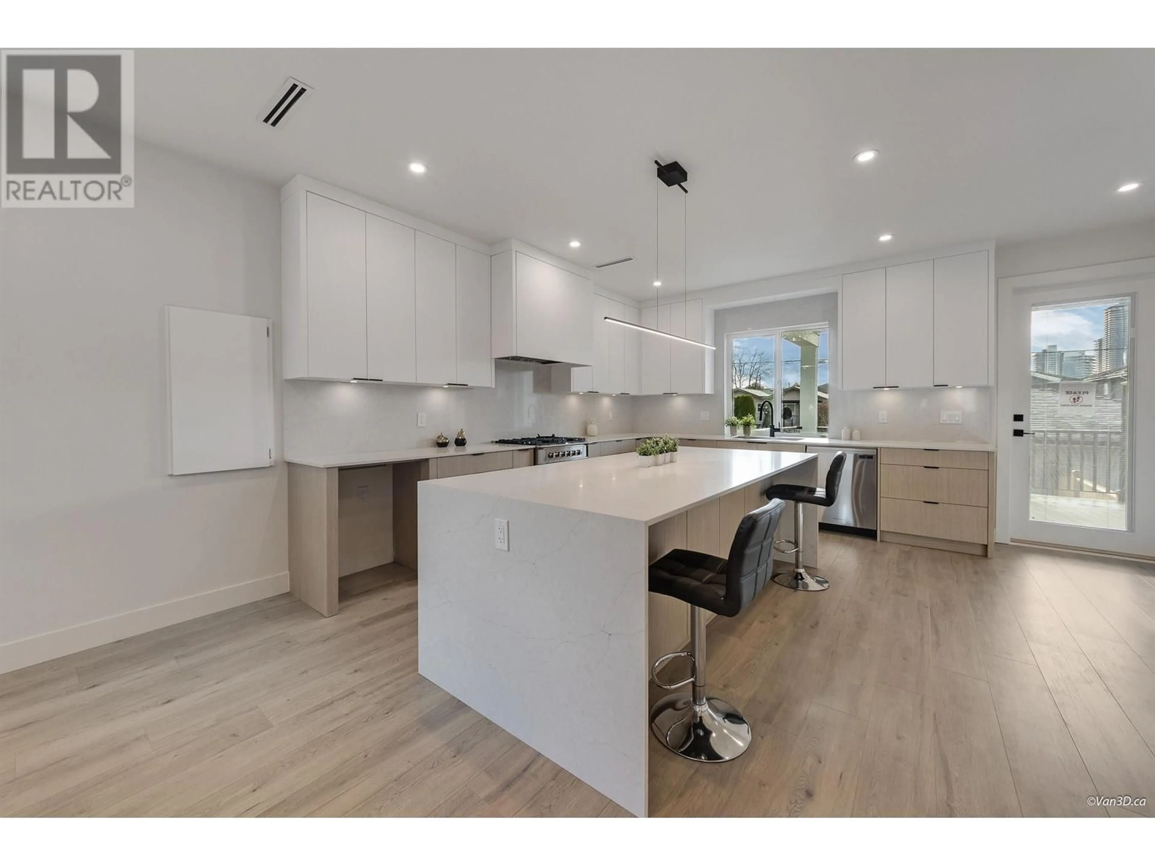 Open concept kitchen, wood/laminate floor for 4230 NAPIER STREET, Burnaby British Columbia V5C3G6