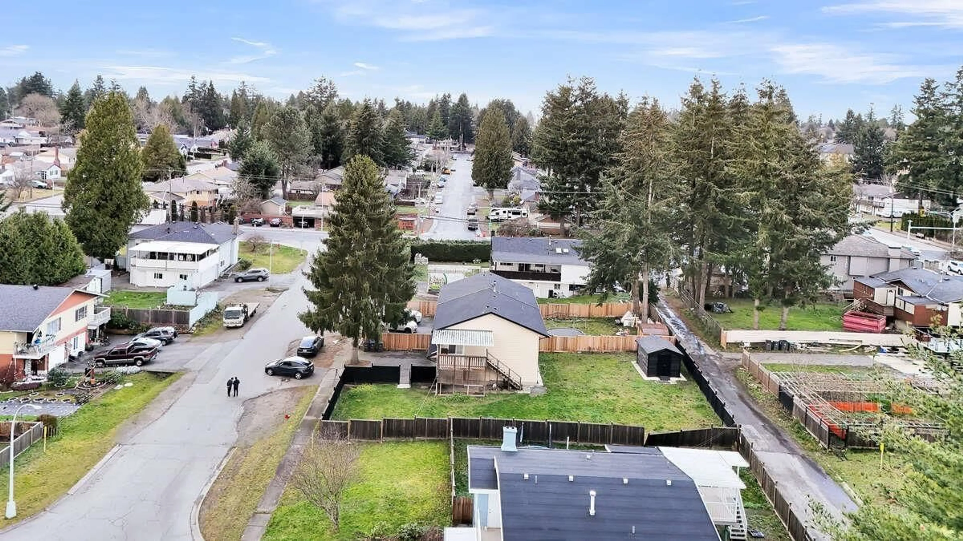 A pic from outside/outdoor area/front of a property/back of a property/a pic from drone, street for 9974 127B STREET, Surrey British Columbia V3V6T1