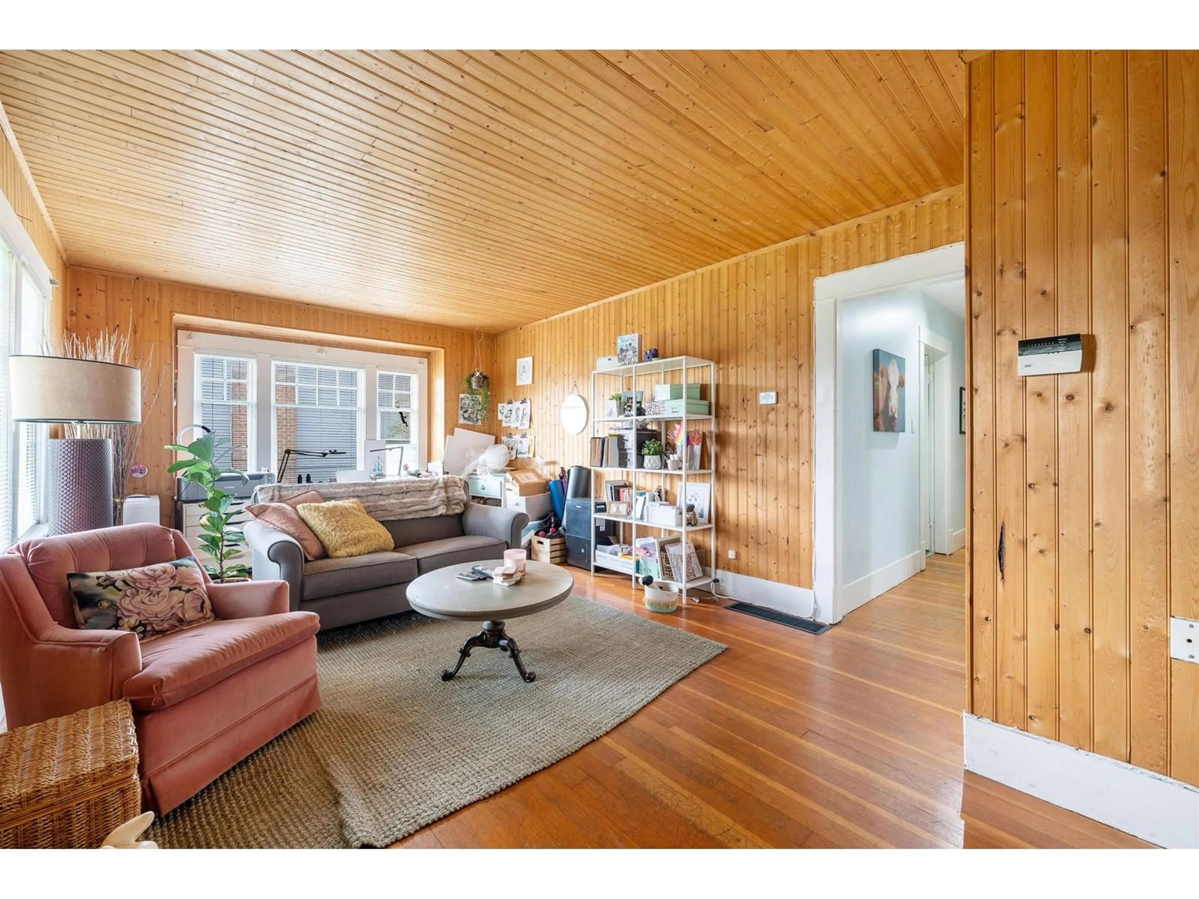 Living room with furniture, wood/laminate floor for 6119 176 STREET, Surrey British Columbia V3S4E8