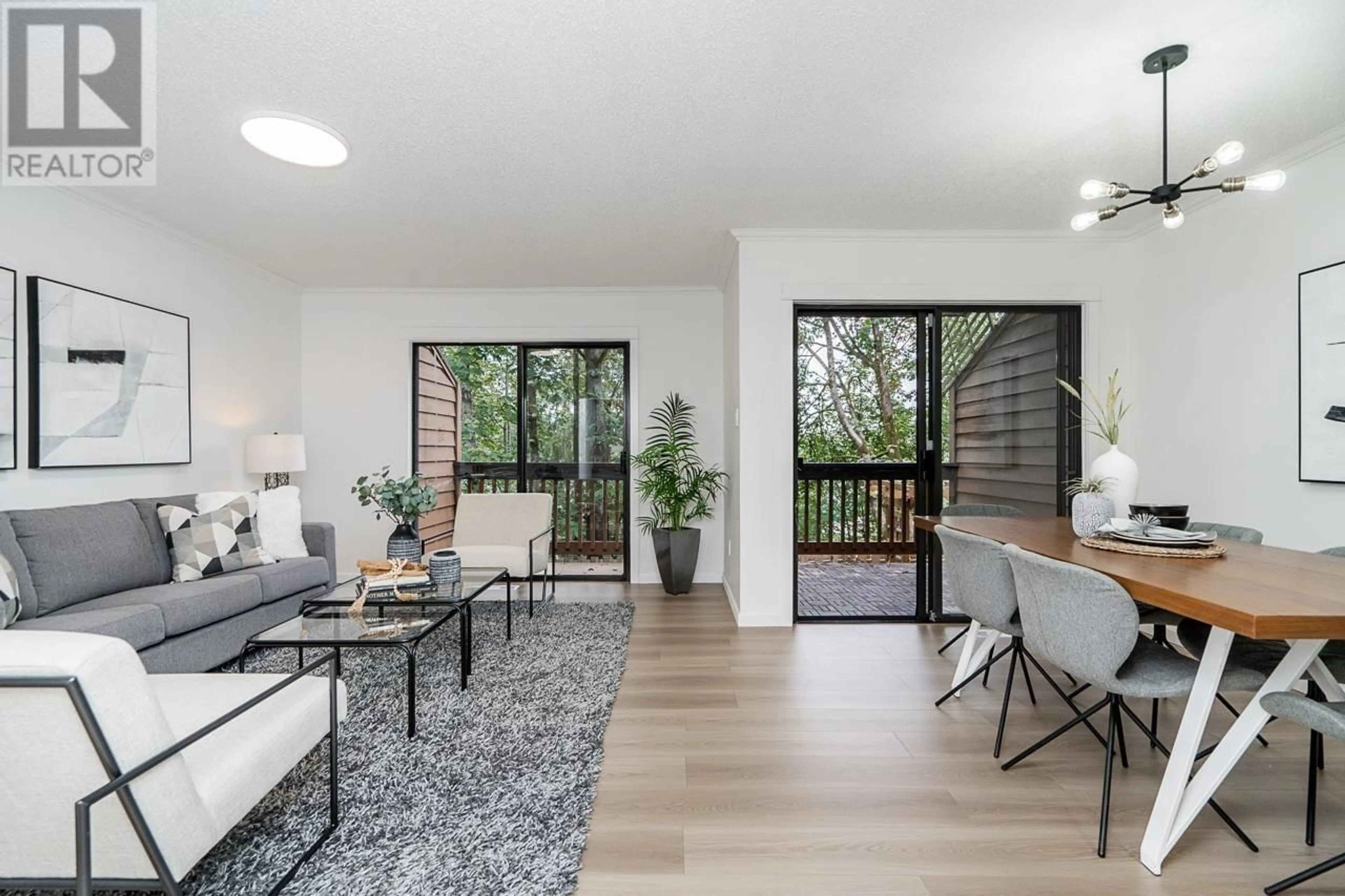 Living room with furniture, wood/laminate floor for 434 CAMBRIDGE WAY, Port Moody British Columbia V3H3V2