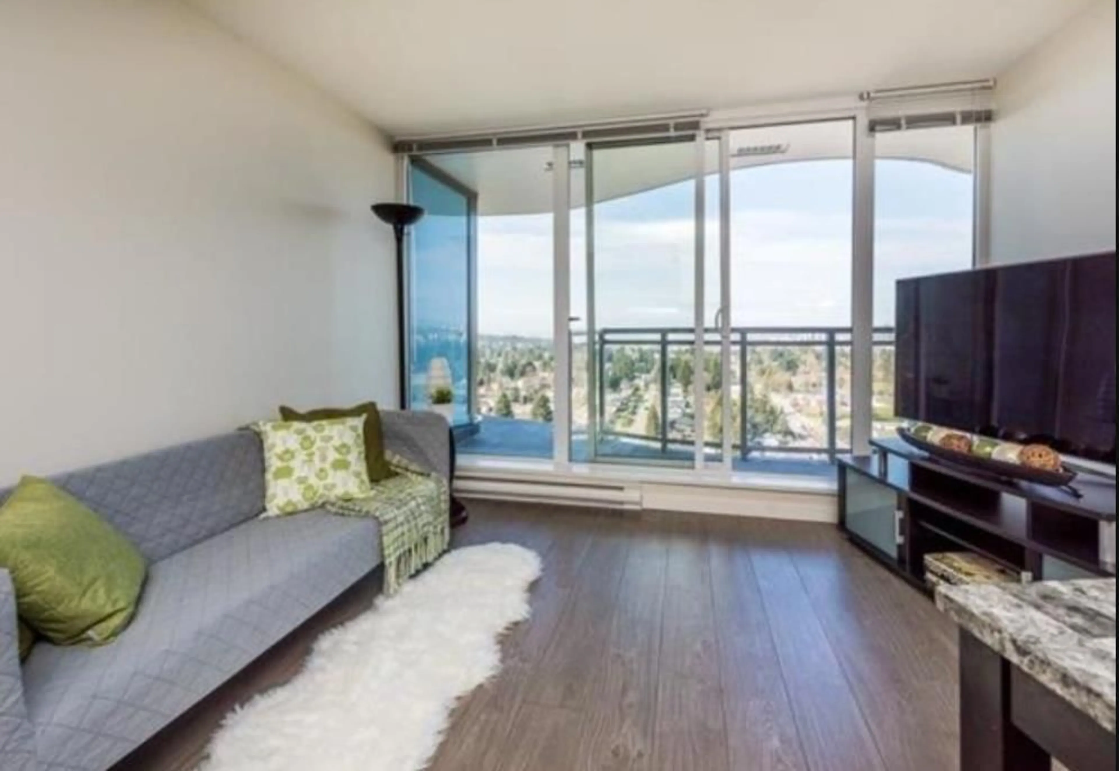 Living room with furniture, wood/laminate floor for 2501 - 13303 CENTRAL, Surrey British Columbia V3T0K6