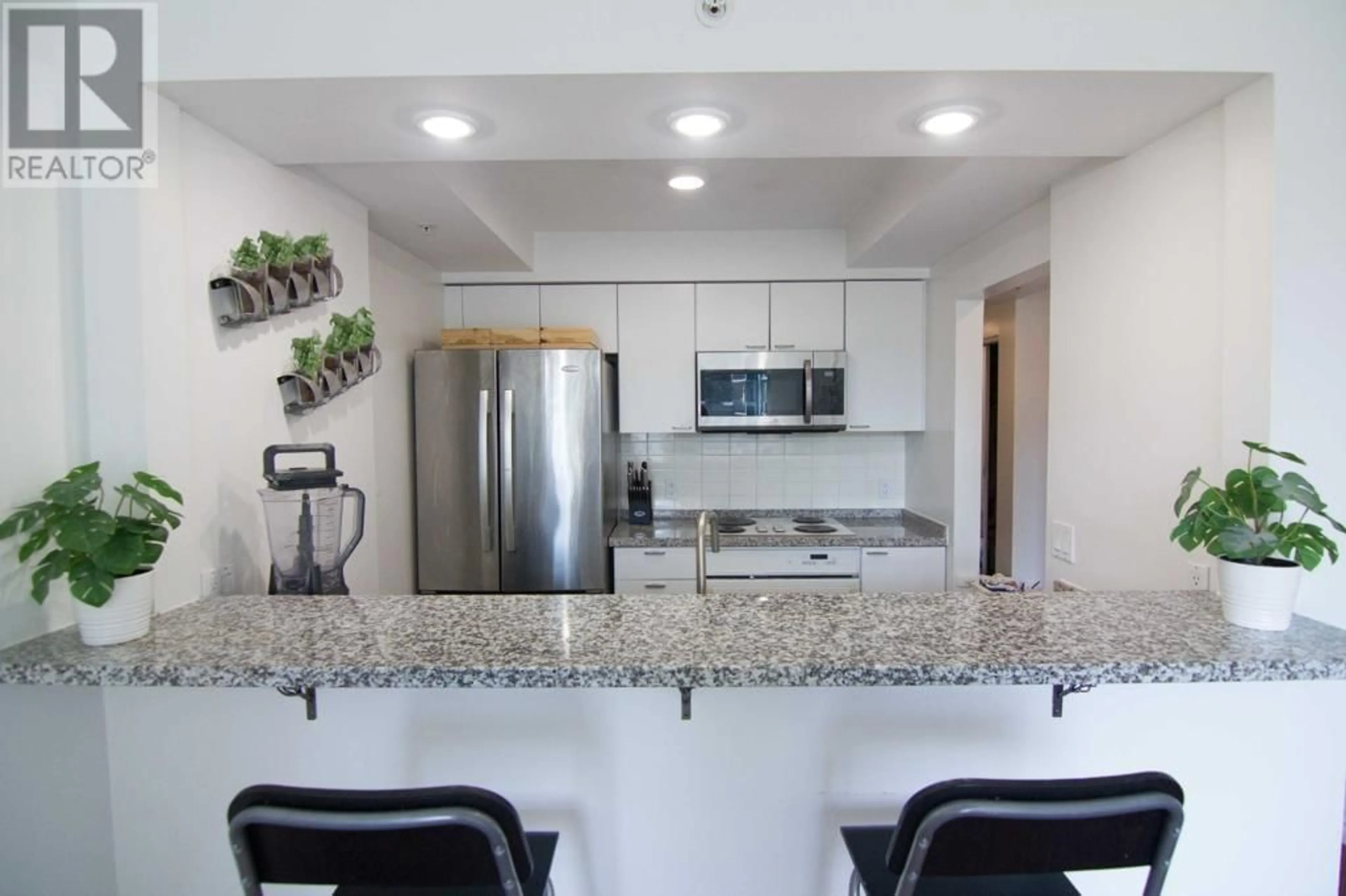 Open concept kitchen, ceramic/tile floor for 502 1288 ALBERNI STREET, Vancouver British Columbia V6E4N5