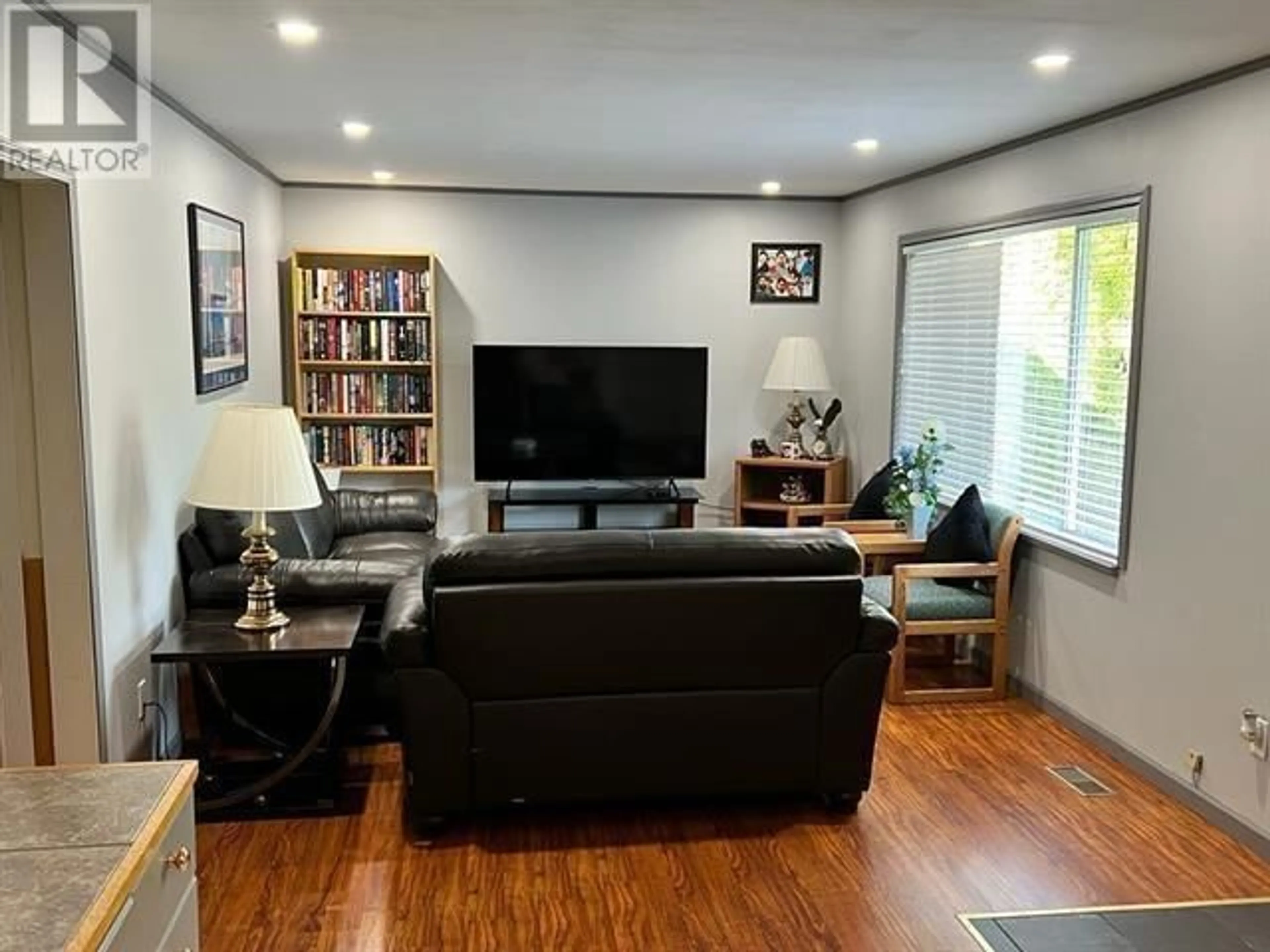 Living room with furniture, wood/laminate floor for 12313 228 STREET, Maple Ridge British Columbia V2X6M5