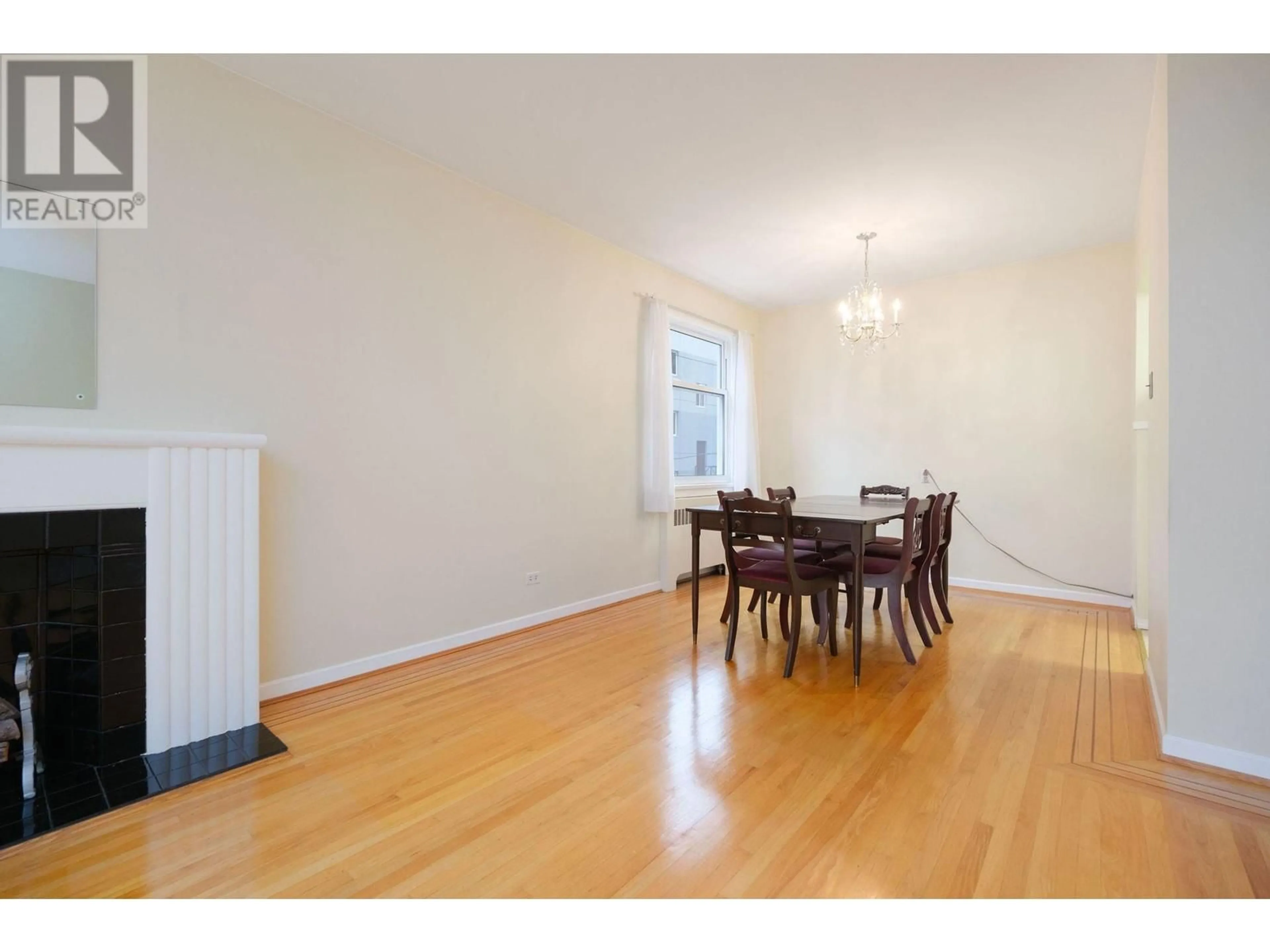 Dining room, wood/laminate floor for 203 1878 ROBSON STREET, Vancouver British Columbia V6G1E3