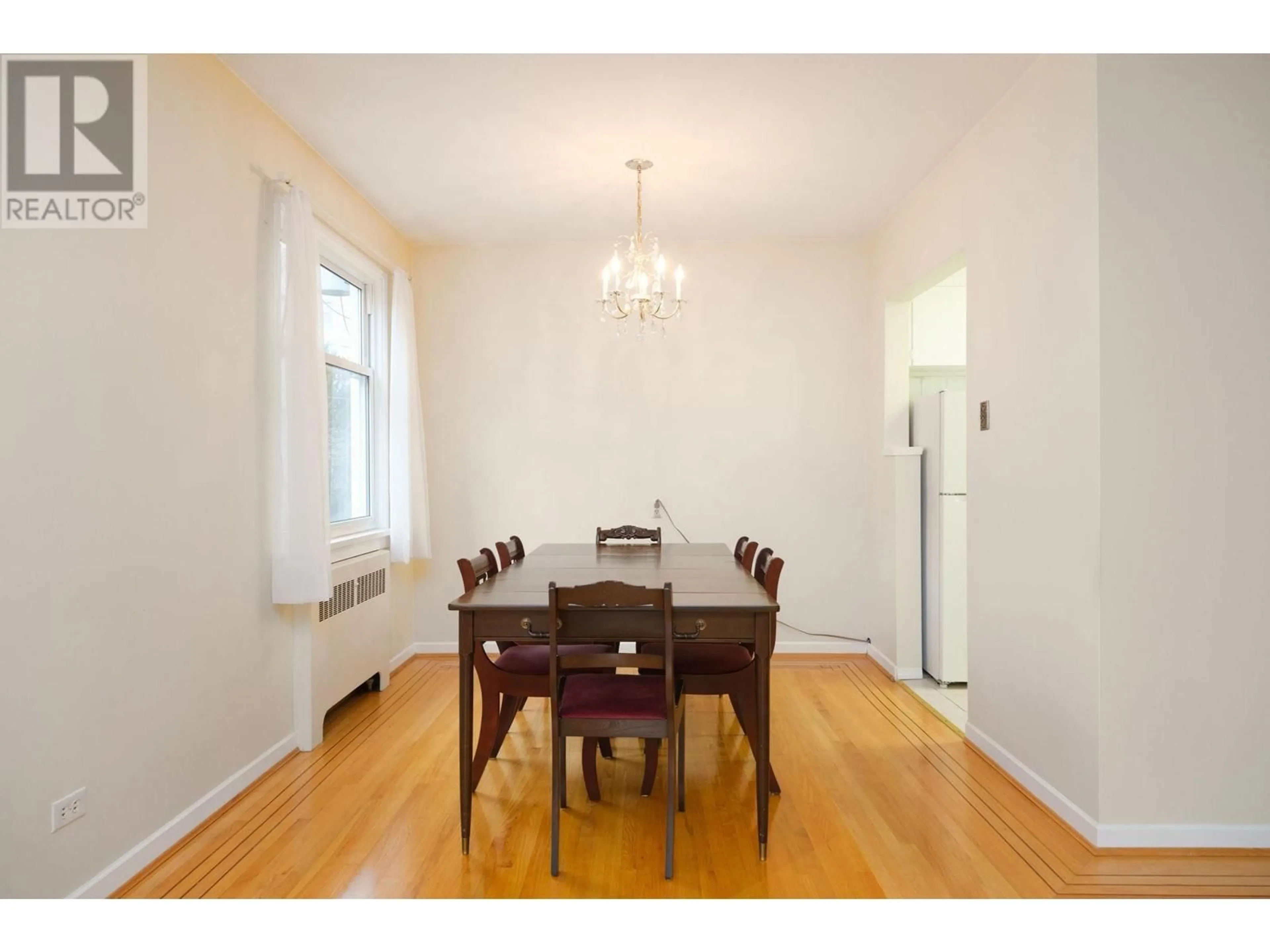 Dining room, wood/laminate floor for 203 1878 ROBSON STREET, Vancouver British Columbia V6G1E3