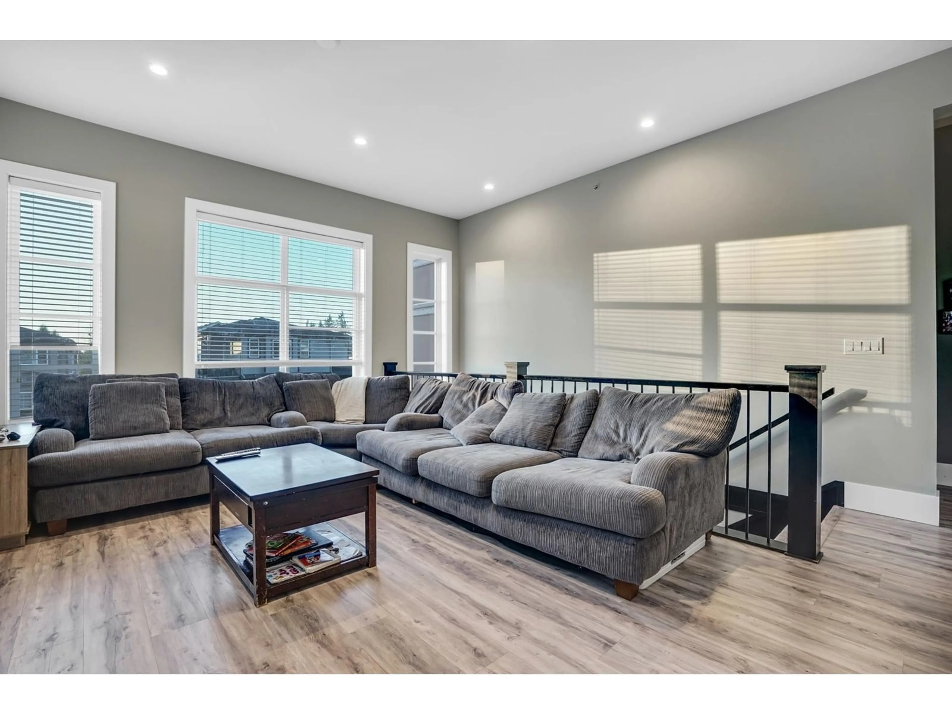 Living room with furniture, wood/laminate floor for 8518 LEGACE DRIVE, Mission British Columbia V2V0H1