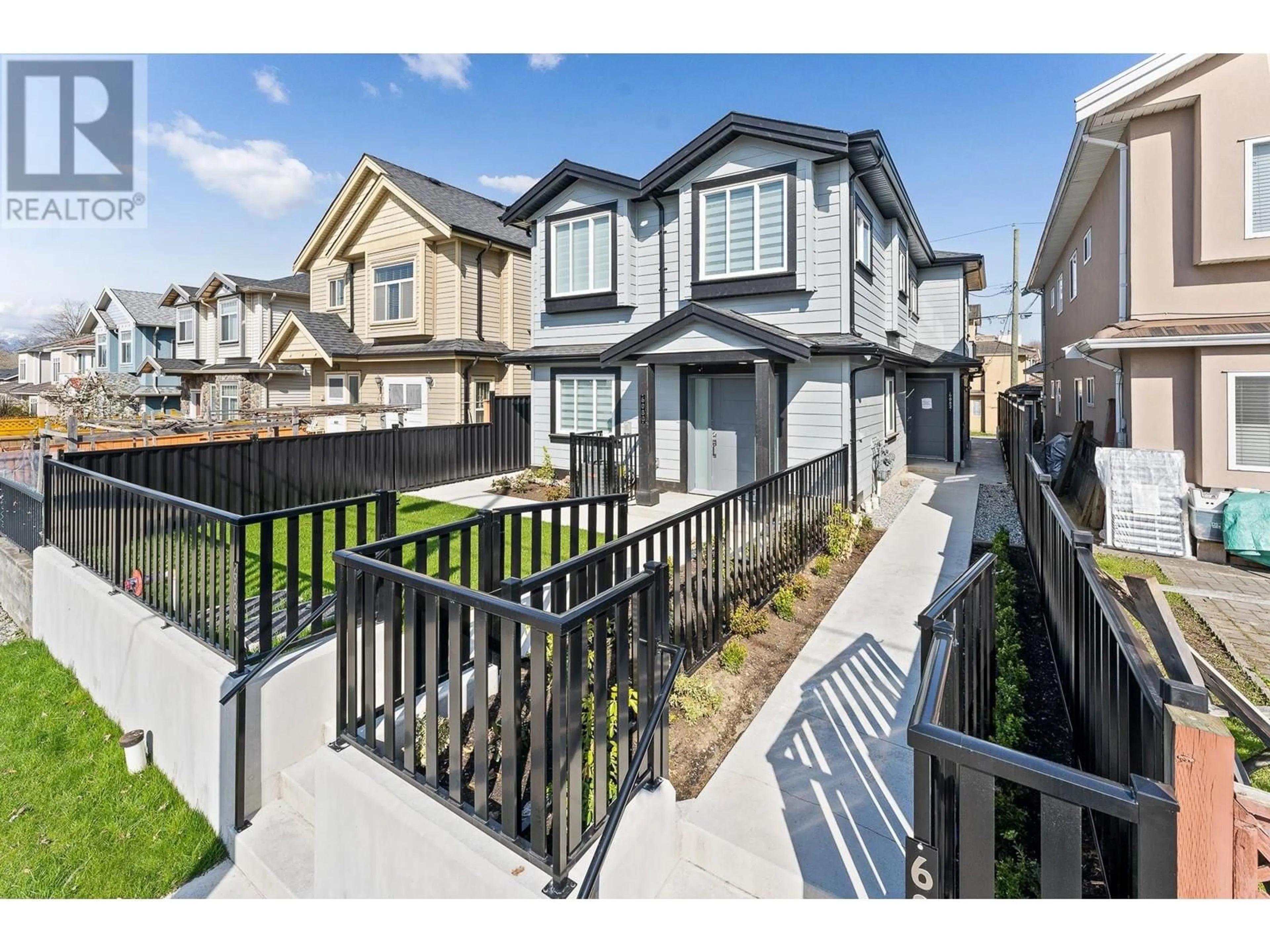 A pic from outside/outdoor area/front of a property/back of a property/a pic from drone, street for 6082 VICTORIA DRIVE, Vancouver British Columbia V5P3X3