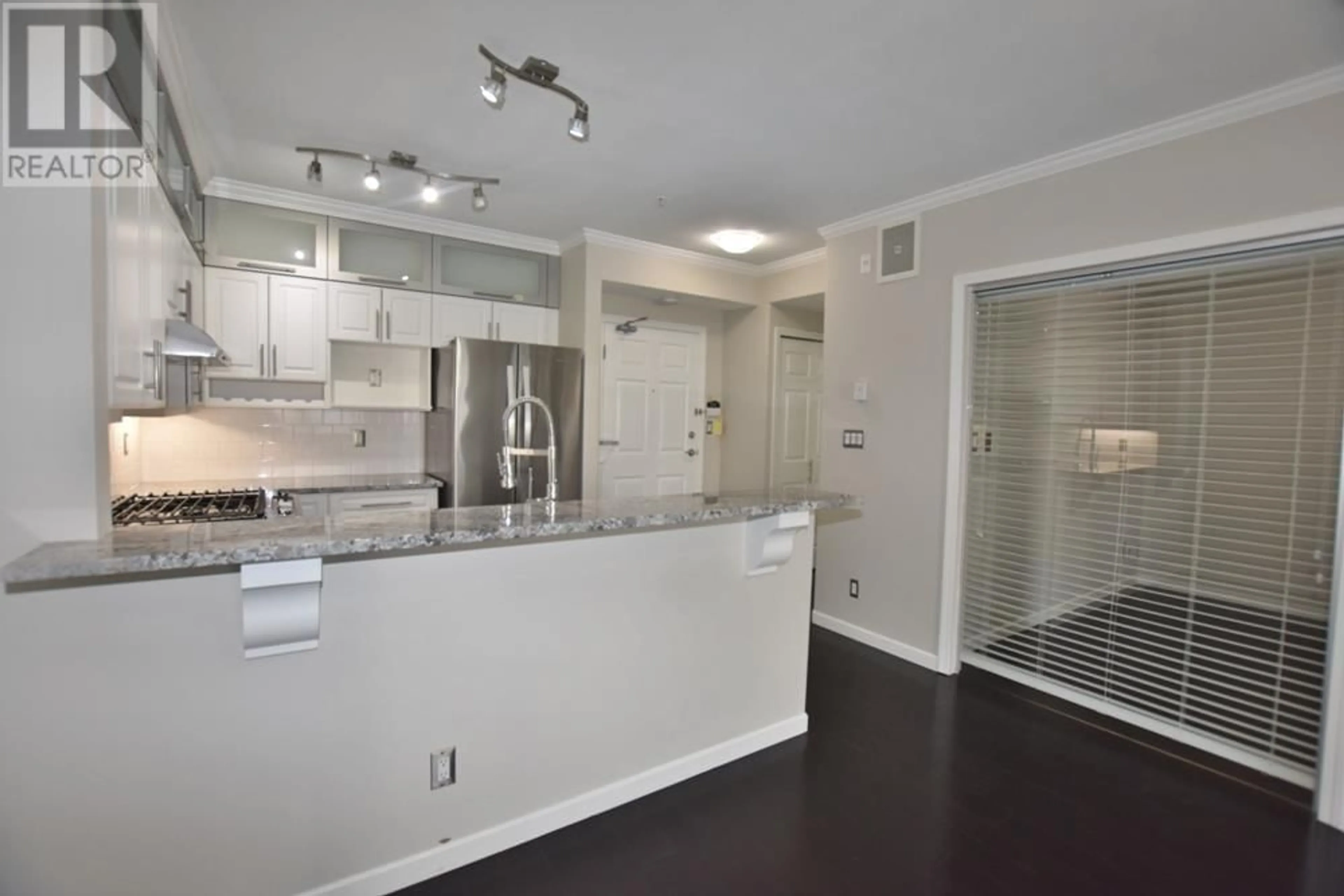 Open concept kitchen, unknown for 408 3629 DEERCREST DRIVE, North Vancouver British Columbia V7J2S9