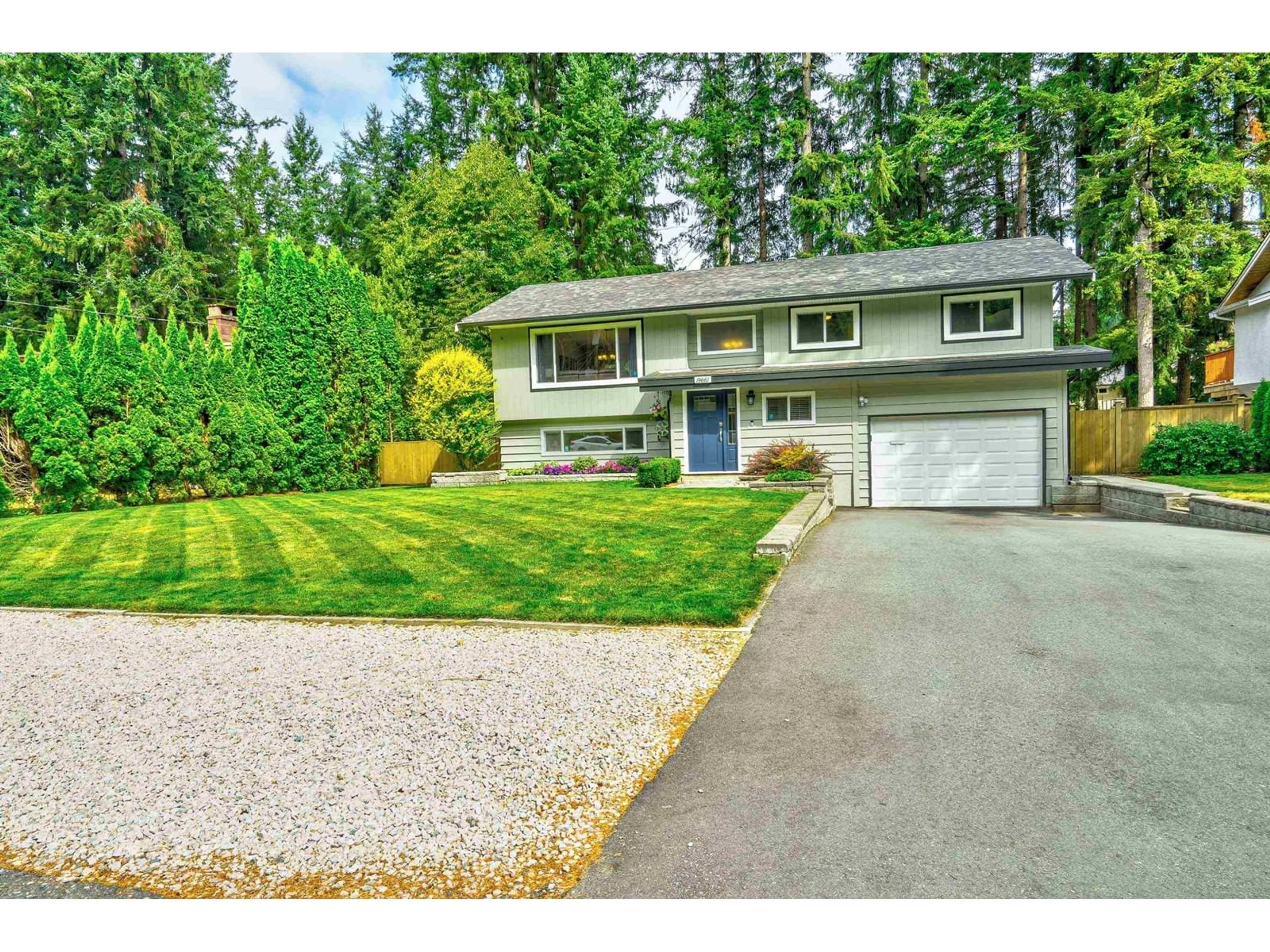 Home with vinyl exterior material, street for 19661 41A AVENUE, Langley British Columbia V3A2Z5