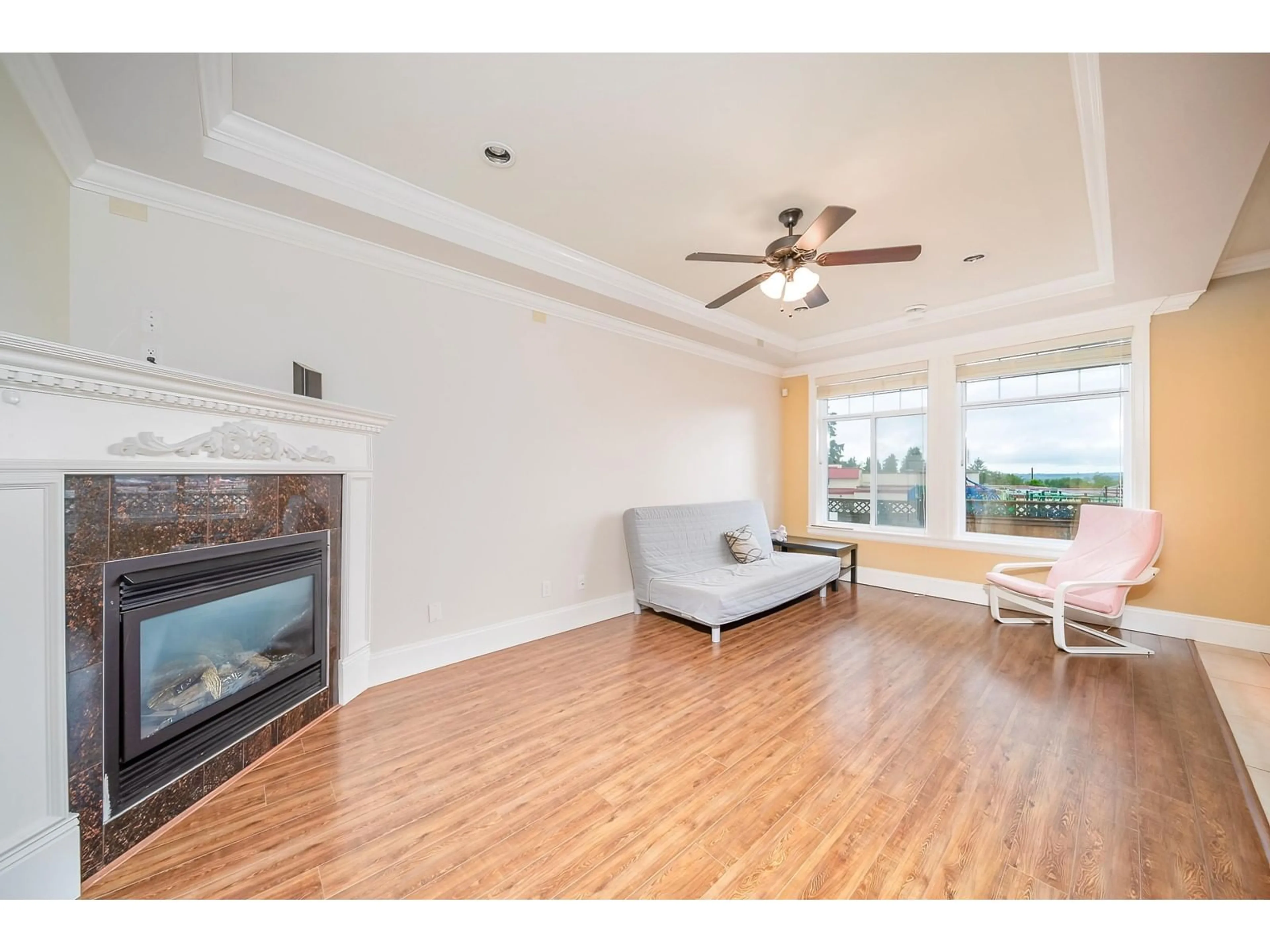 Living room with furniture, wood/laminate floor for 8873 112, Delta British Columbia V4C4X5