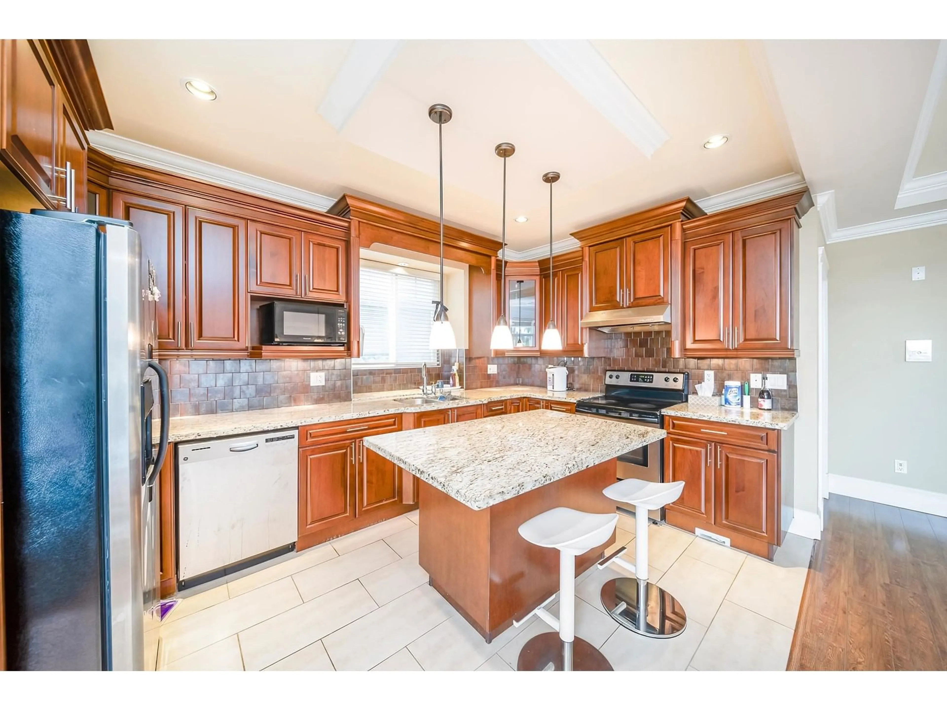 Open concept kitchen, ceramic/tile floor for 8873 112, Delta British Columbia V4C4X5