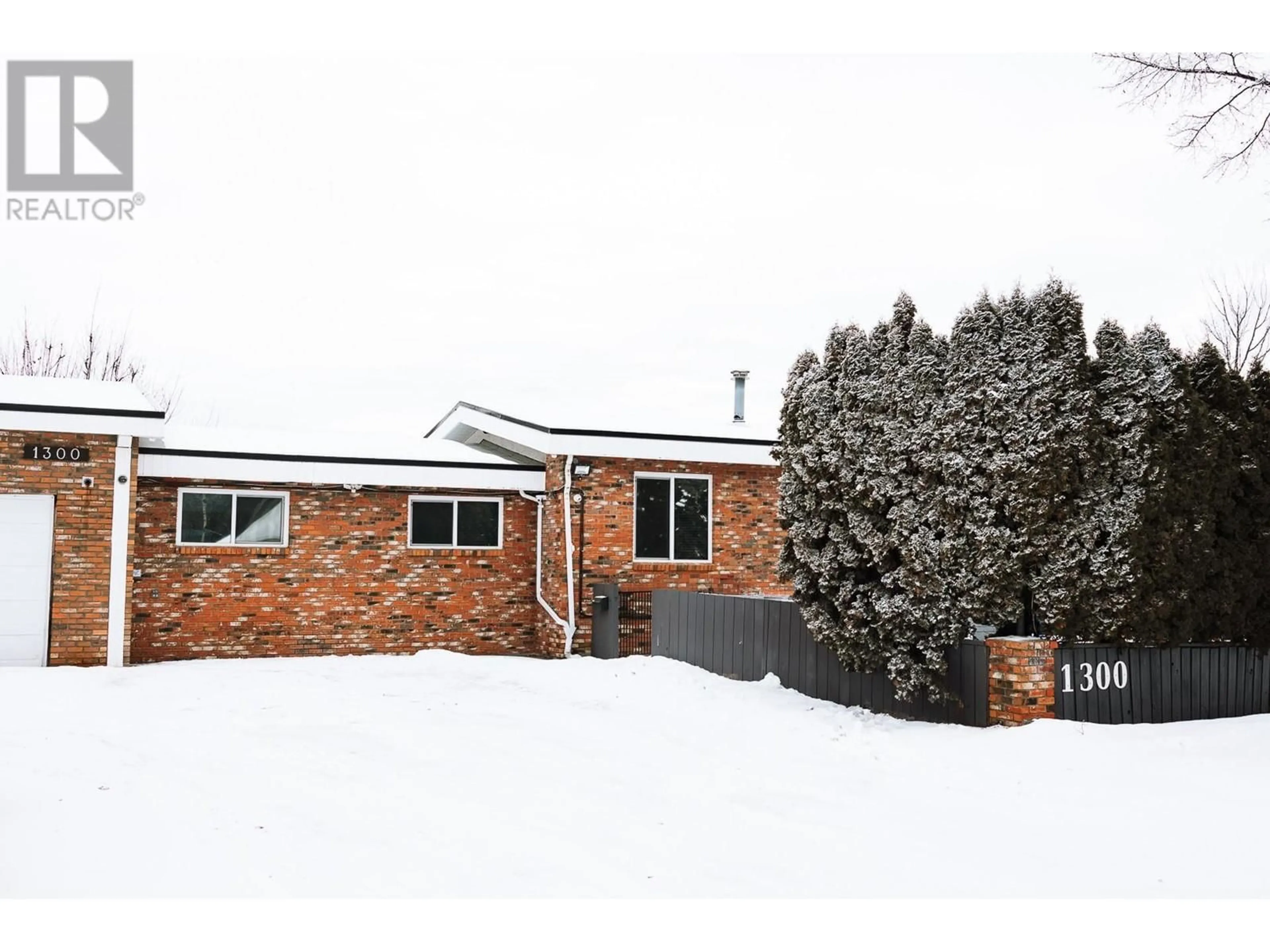 A pic from outside/outdoor area/front of a property/back of a property/a pic from drone, unknown for 1300 BABINE CRESCENT, Prince George British Columbia V2M3X9