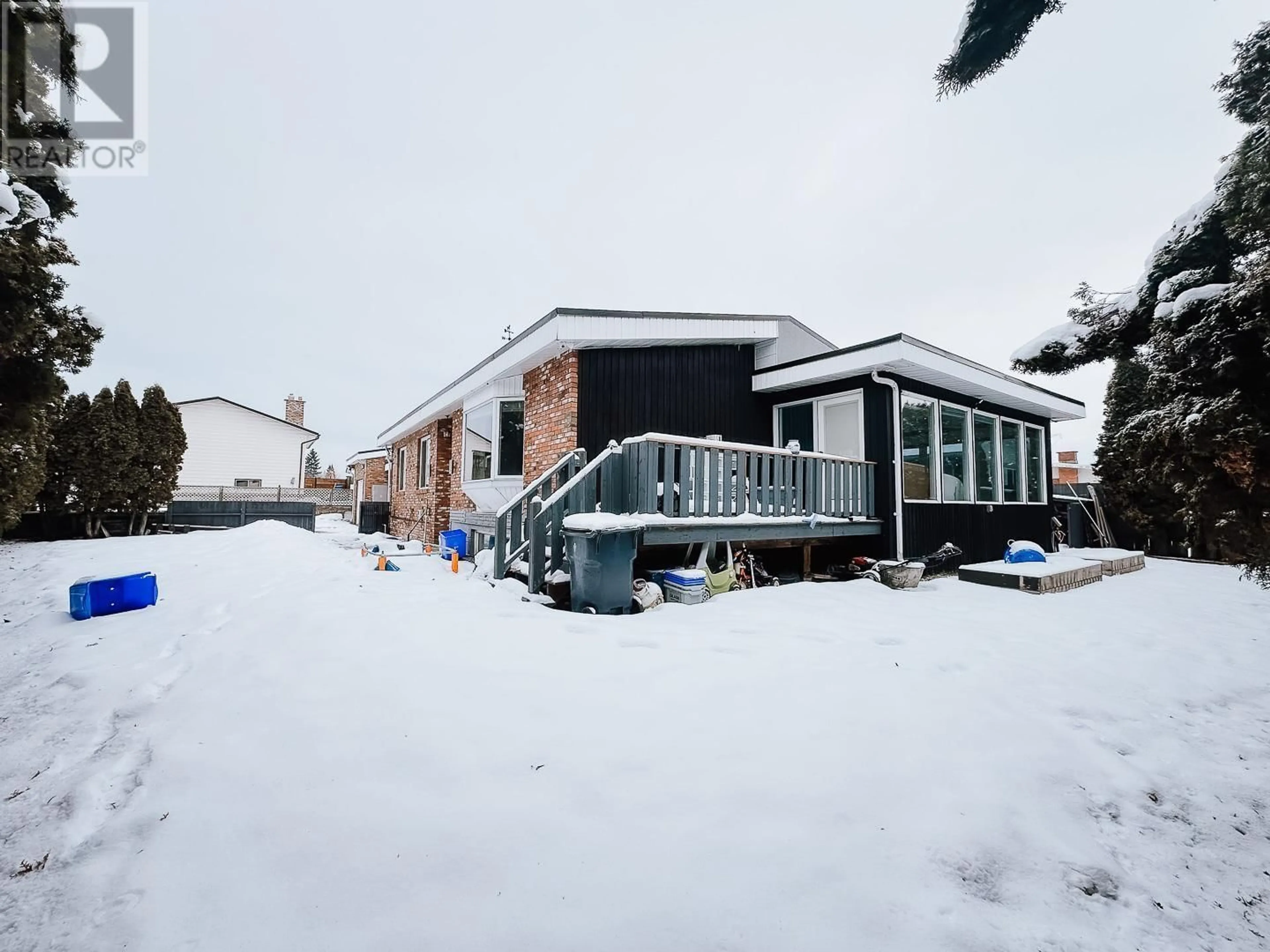 A pic from outside/outdoor area/front of a property/back of a property/a pic from drone, street for 1300 BABINE CRESCENT, Prince George British Columbia V2M3X9